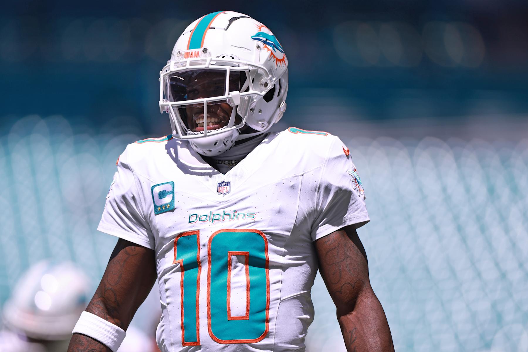 MIAMI GARDENS, FLORIDA - SEPTEMBER 08: Tyreek Hill #10 of the Miami Dolphins looks on prior to a game against the Jacksonville Jaguars at Hard Rock Stadium on September 08, 2024 in Miami Gardens, Florida. (Photo by Carmen Mandato/Getty Images)