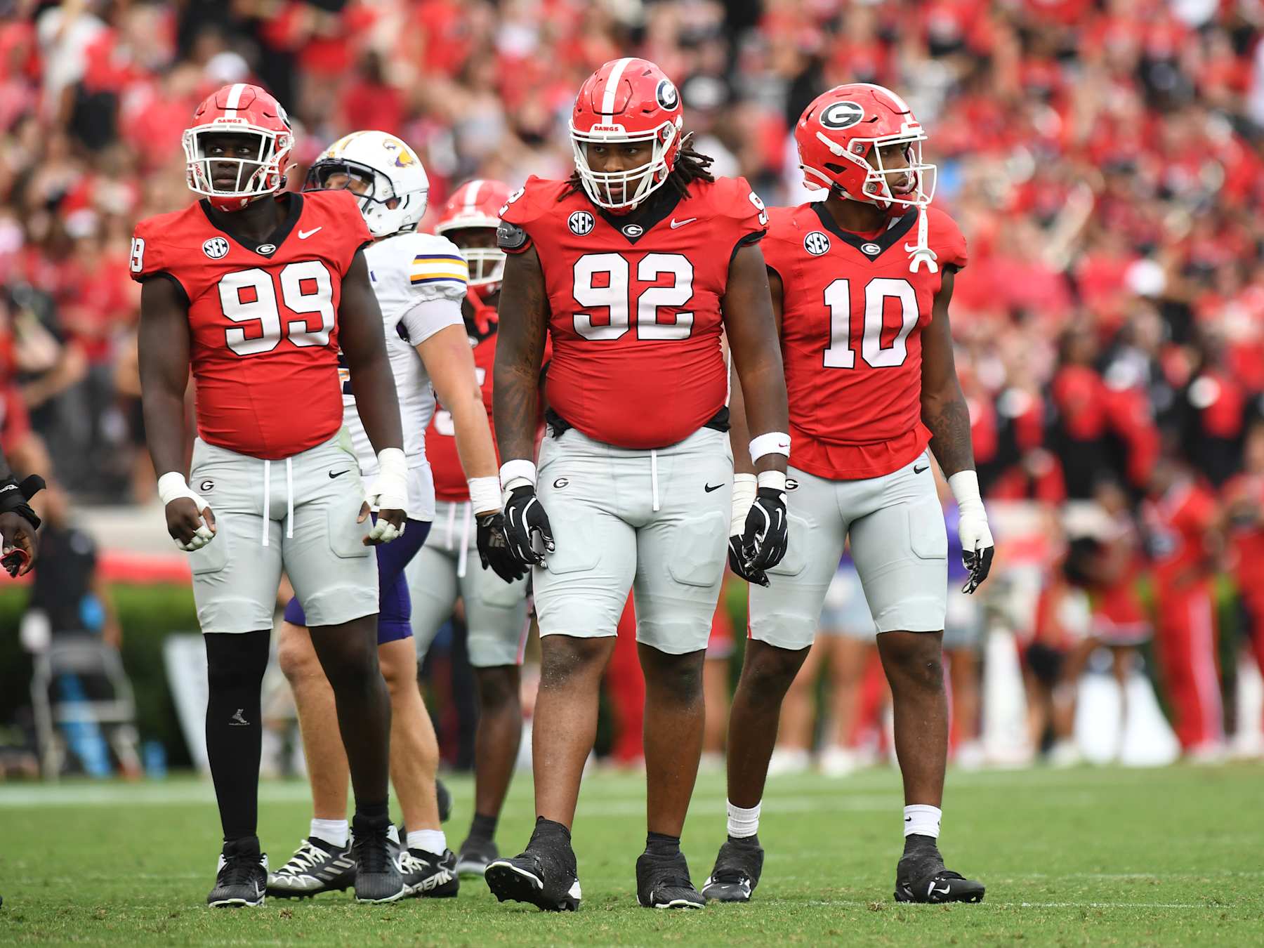 ATHENS, GA - SEPTEMBER 07: Georgia Bulldogs defensive linemen Joseph Jonah-Ajonye (99) and Georgia Bulldogs defensive linemen Jordan Thomas (92) look on during the college football game between the Tennessee Tech Golden Eagles and the Georgia Bulldogs on September 07, 2024, at Sanford Stadium in Athens, GA. (Photo by Jeffrey Vest/Icon Sportswire via Getty Images)