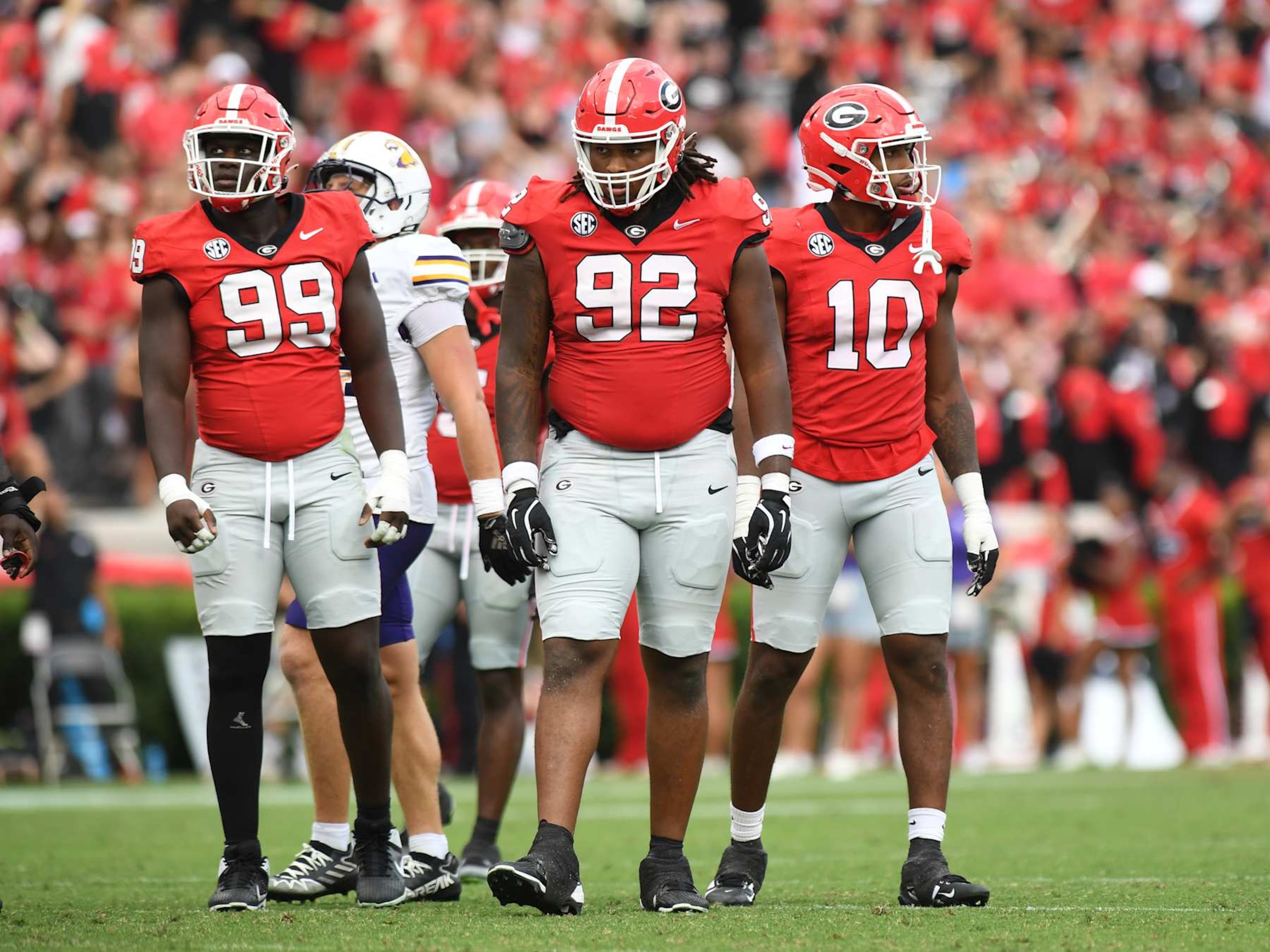 ATHENS, GA - SEPTEMBER 07: Georgia Bulldogs defensive linemen Joseph Jonah-Ajonye (99) and Georgia Bulldogs defensive linemen Jordan Thomas (92) look on during the college football game between the Tennessee Tech Golden Eagles and the Georgia Bulldogs on September 07, 2024, at Sanford Stadium in Athens, GA. (Photo by Jeffrey Vest/Icon Sportswire via Getty Images)