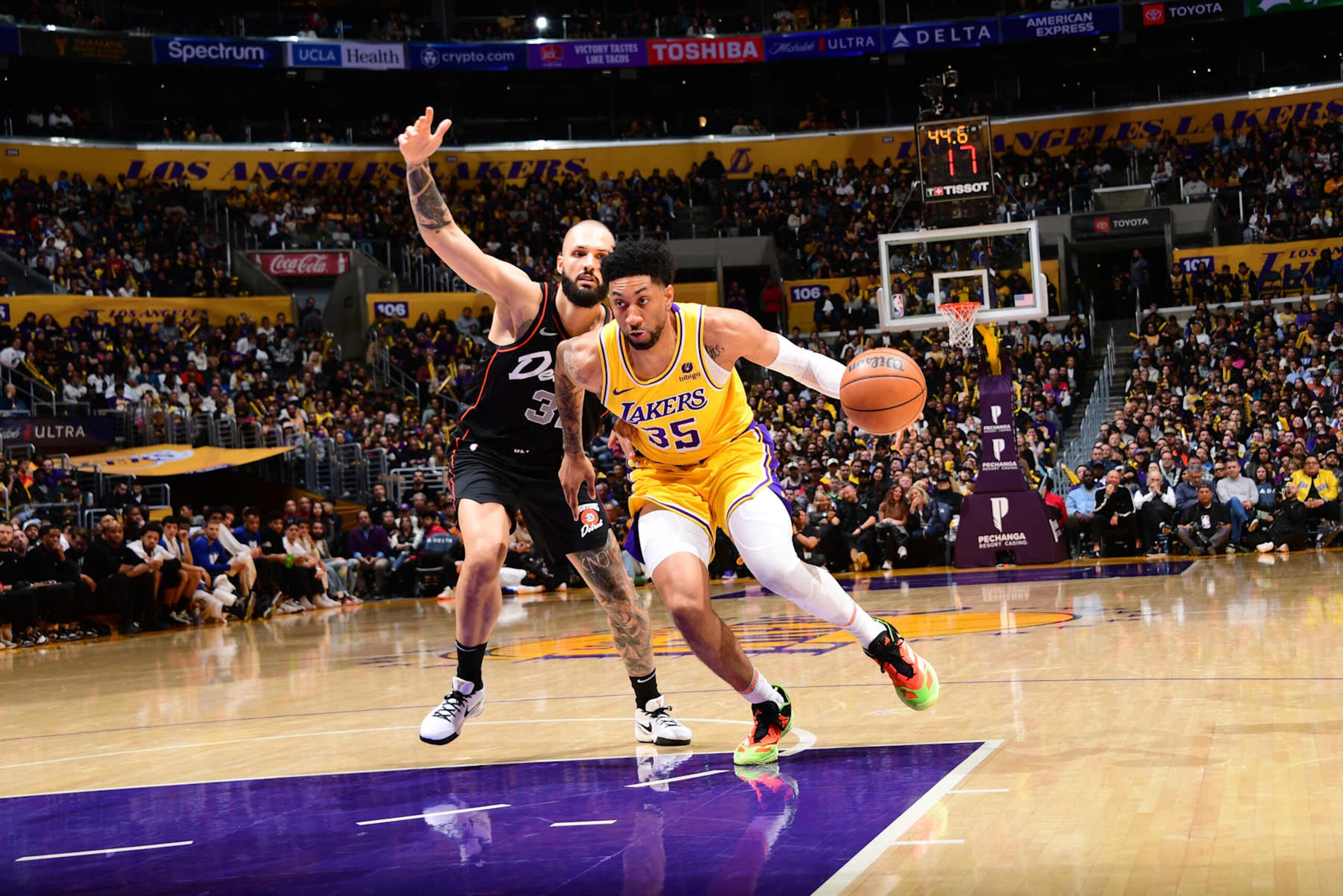 LOS ANGELES, CA - FEBRUARY 13: Christian Wood #35 of the Los Angeles Lakers dribbles the ball during the game against the Detroit Pistons on February 13, 2024 at Crypto.Com Arena in Los Angeles, California. NOTE TO USER: User expressly acknowledges and agrees that, by downloading and/or using this Photograph, user is consenting to the terms and conditions of the Getty Images License Agreement. Mandatory Copyright Notice: Copyright 2024 NBAE (Photo by Adam Pantozzi/NBAE via Getty Images)