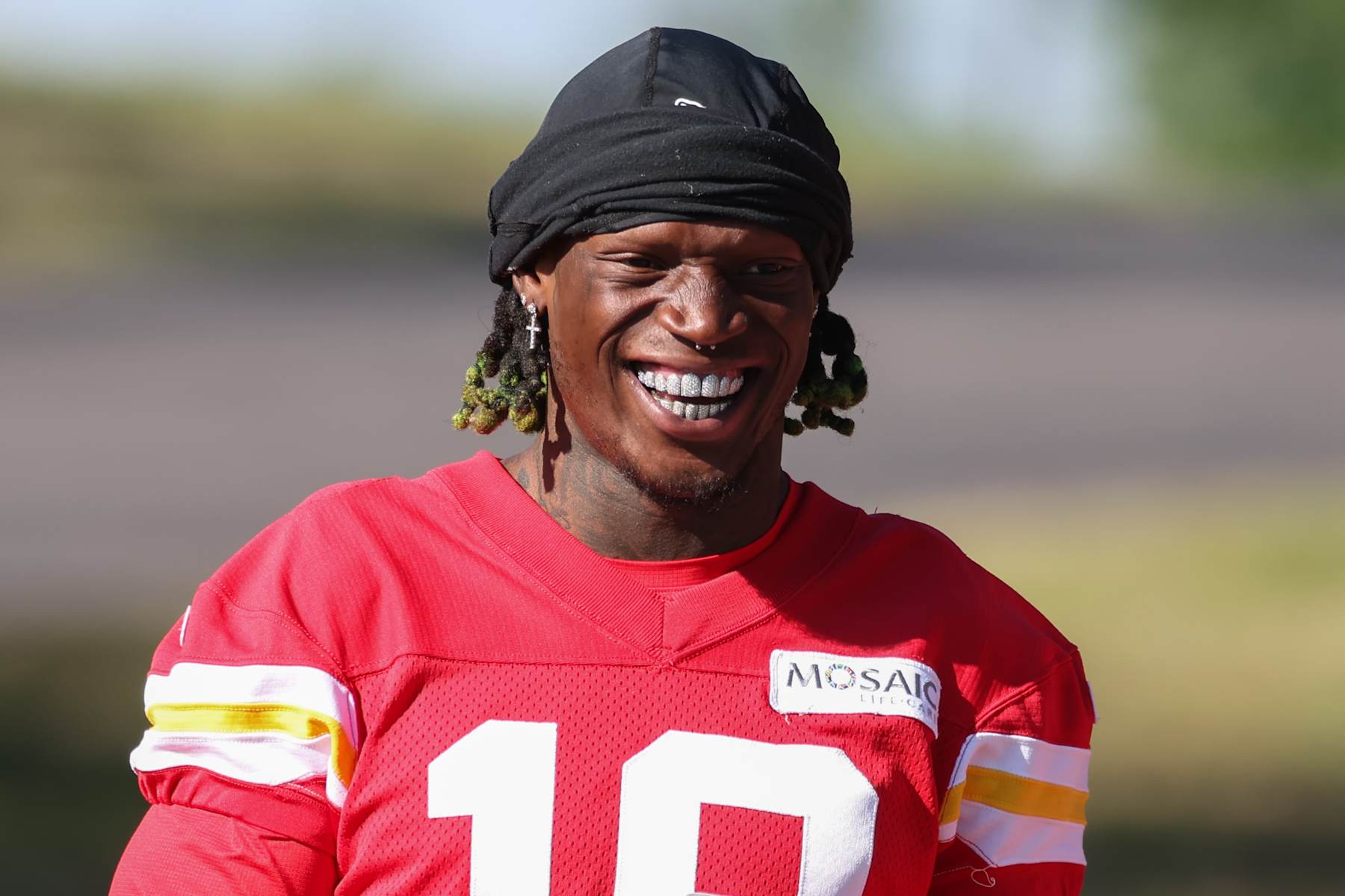 ST. JOSEPH, MO - AUGUST 02: Kansas City Chiefs wide receiver Kadarius Toney (19) smiles and shows off his teeth during training camp on August 2, 2024 at Missouri Western State University in St. Joseph, MO. (Photo by Scott Winters/Icon Sportswire via Getty Images) ST. JOSEPH, MO - AUGUST 02: Kansas City Chiefs wide receiver Kadarius Toney (19) smiles and shows off his teeth during training camp on August 2, 2024 at Missouri Western State University in St. Joseph, MO. (Photo by Scott Winters/Icon Sportswire via Getty Images)