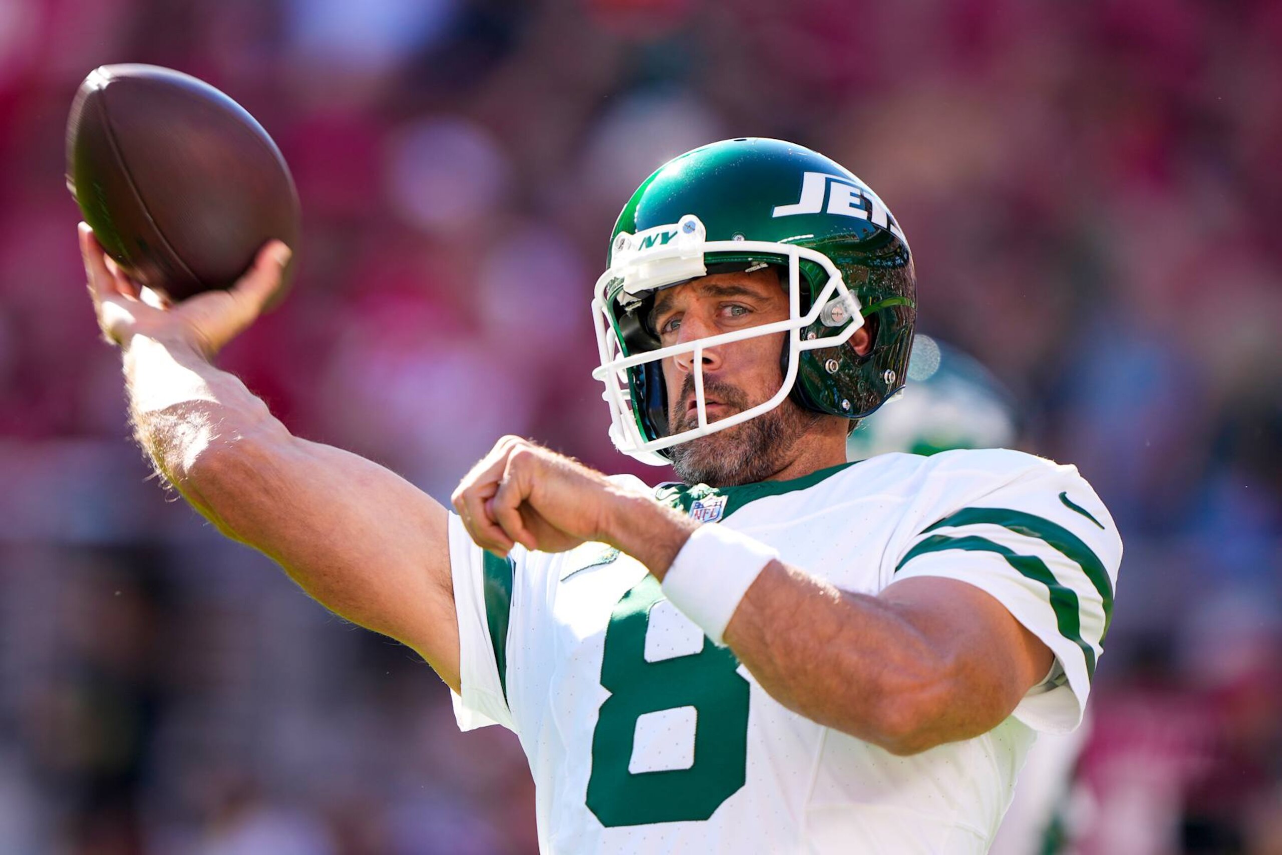 SANTA CLARA, CALIFORNIA - SEPTEMBER 09: Quarterback Aaron Rodgers #8 of the New York Jets warms up before taking on the San Francisco 49ers at Levi's Stadium on September 09, 2024 in Santa Clara, California. (Photo by Thearon W. Henderson/Getty Images)