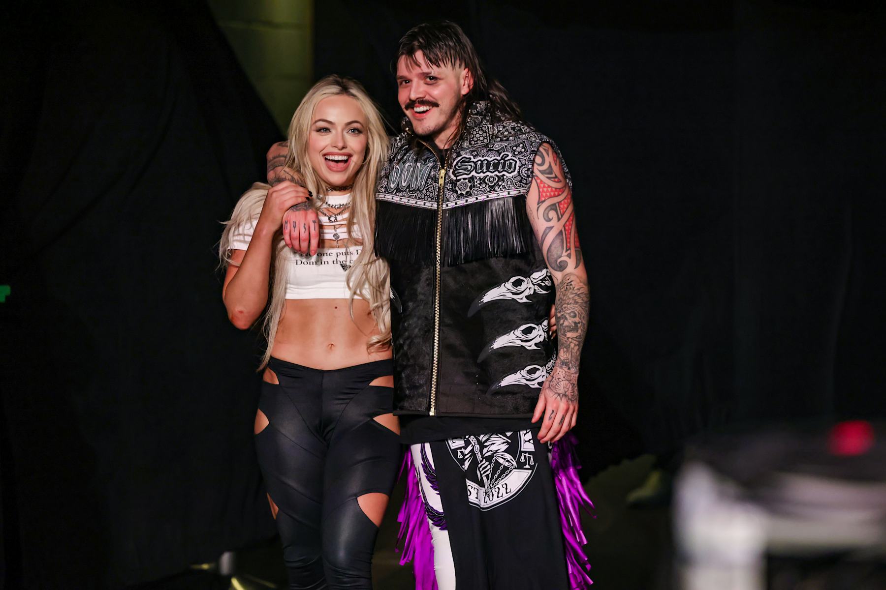 DENVER, COLORADO - SEPTEMBER 2: Liv Morgan and "Dirty" Dominik Mysterio look on during Monday Night RAW at Ball Arena on September 2, 2024 in Denver, Colorado. (Photo by WWE/Getty Images)