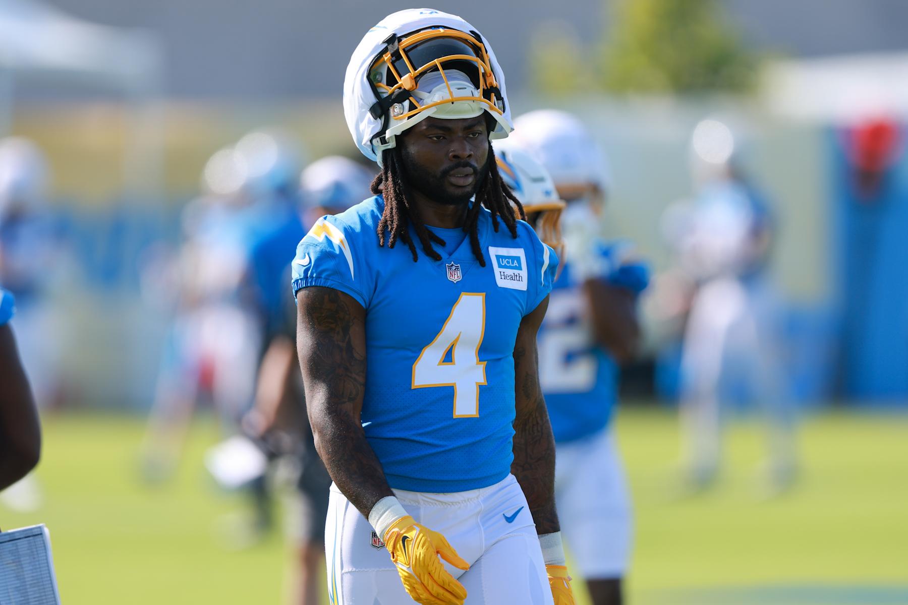 EL SEGUNDO, CA - JULY 24: Los Angeles Chargers running back Gus Edwards (4) takes a break from drills during the Los Angeles Chargers Training Camp on July 24, 2024, at The Bolt in El Segundo, CA. (Photo by Jordon Kelly/Icon Sportswire via Getty Images)