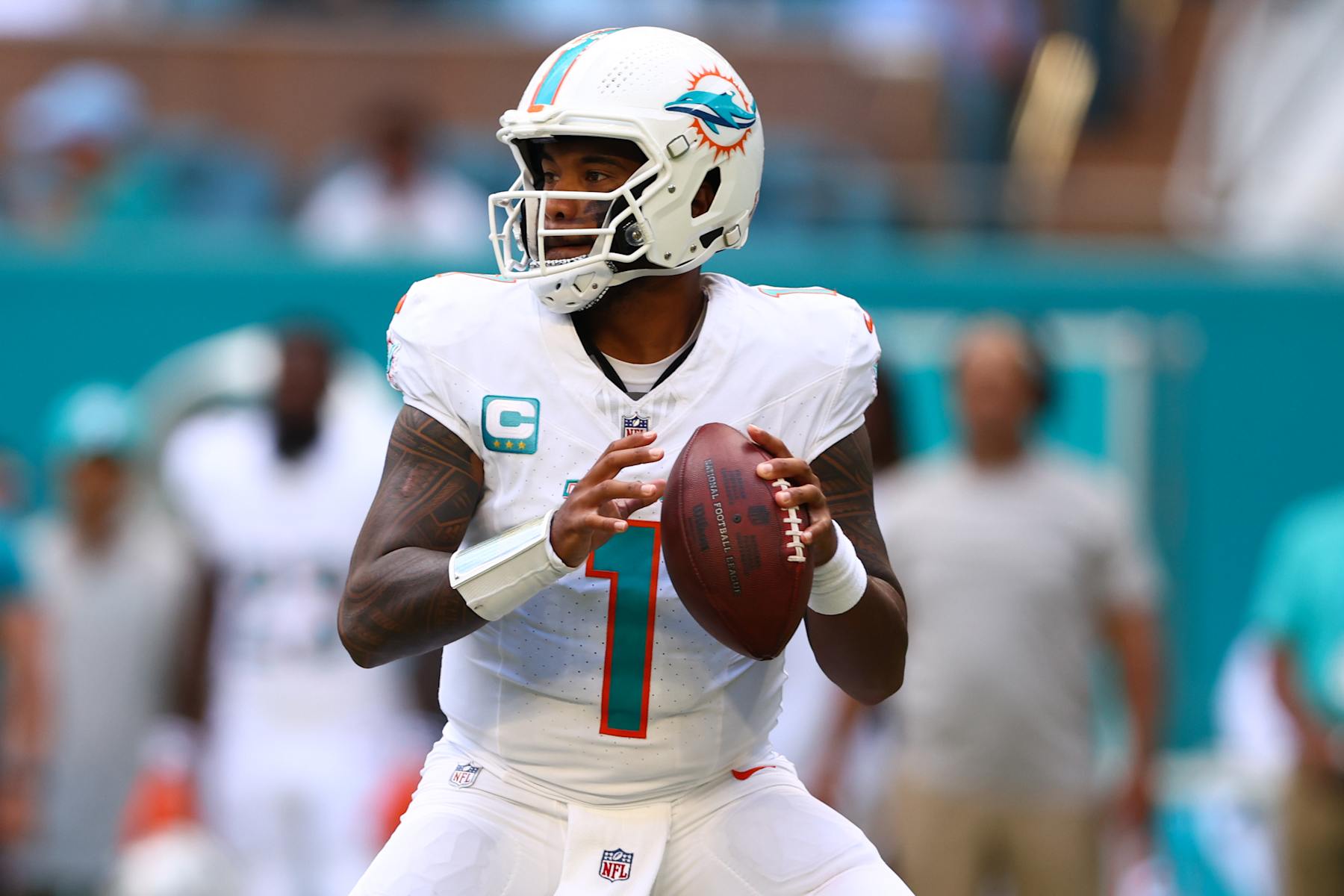 MIAMI GARDENS, FLORIDA - SEPTEMBER 08: Tua Tagovailoa #1 of the Miami Dolphins looks to pass against the Jacksonville Jaguars during the first quarter of the game at Hard Rock Stadium on September 08, 2024 in Miami Gardens, Florida. (Photo by Megan Briggs/Getty Images)