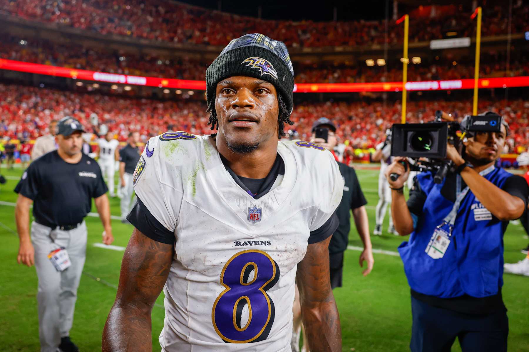 KANSAS CITY, MISSOURI - SEPTEMBER 5: Lamar Jackson #8 of the Baltimore Ravens looks for players to greet following the 27-20 loss to the Kansas City Chiefs at GEHA Field at Arrowhead Stadium on September 5, 2024 in Kansas City, Missouri. (Photo by David Eulitt/Getty Images)