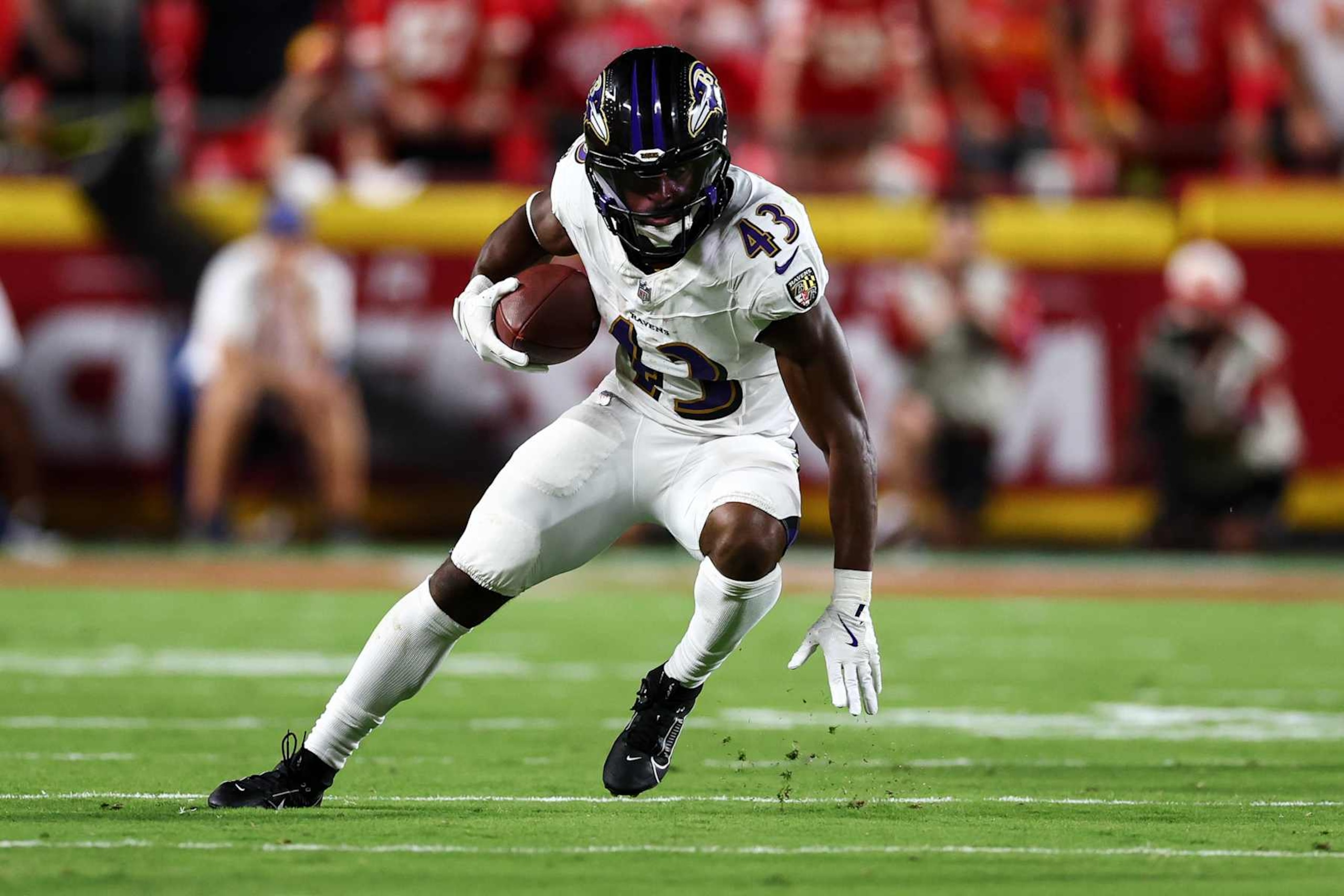 KANSAS CITY, MO - SEPTEMBER 5: Justice Hill #43 of the Baltimore Ravens carries the ball during an NFL football game against the Kansas City Chiefs at GEHA Field at Arrowhead Stadium on September 5, 2024 in Kansas City, Missouri. (Photo by Kevin Sabitus/Getty Images)