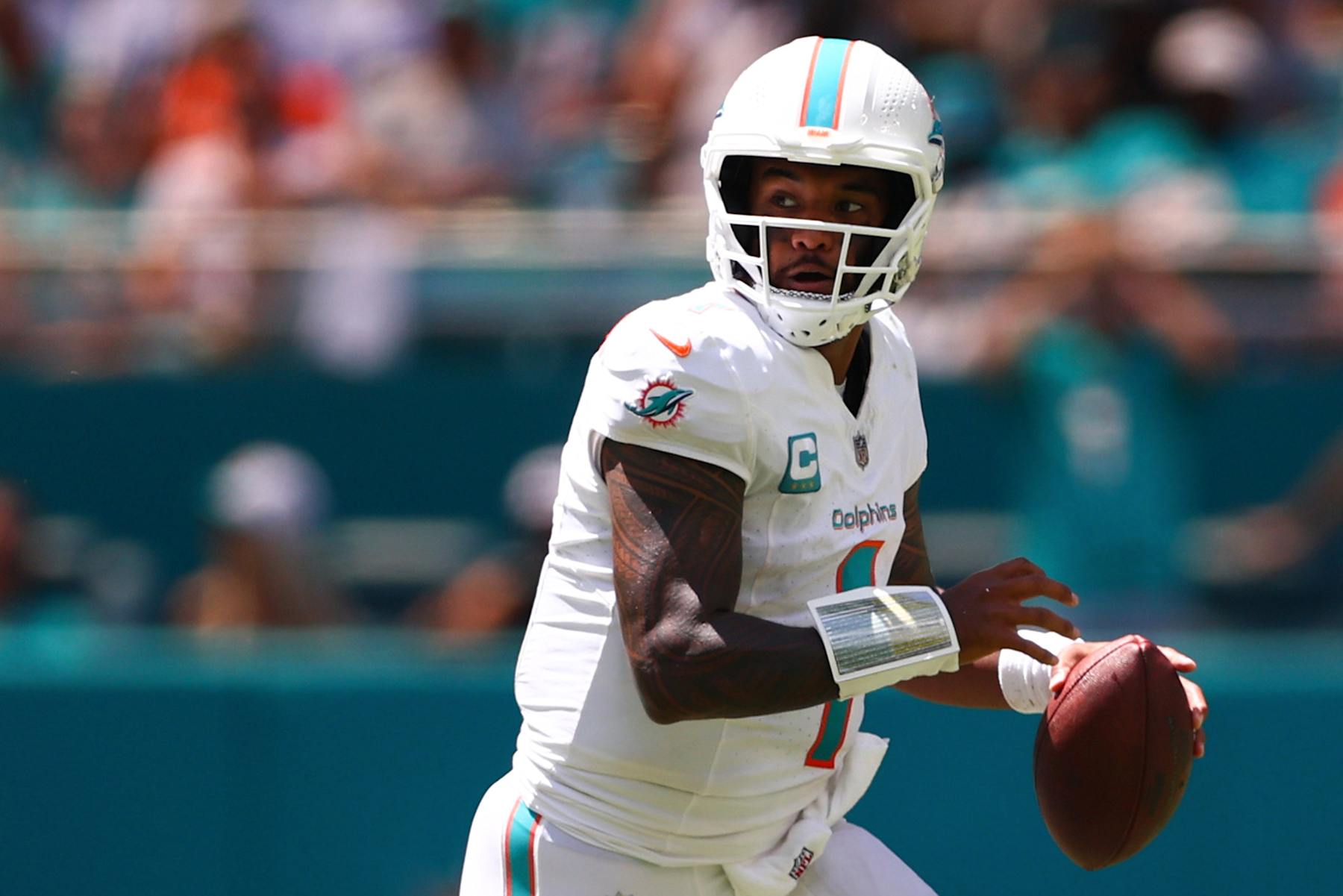 MIAMI GARDENS, FLORIDA - SEPTEMBER 08: Tua Tagovailoa #1 of the Miami Dolphins looks to pass against the Jacksonville Jaguars during the second quarter of the game at Hard Rock Stadium on September 08, 2024 in Miami Gardens, Florida. (Photo by Megan Briggs/Getty Images)
