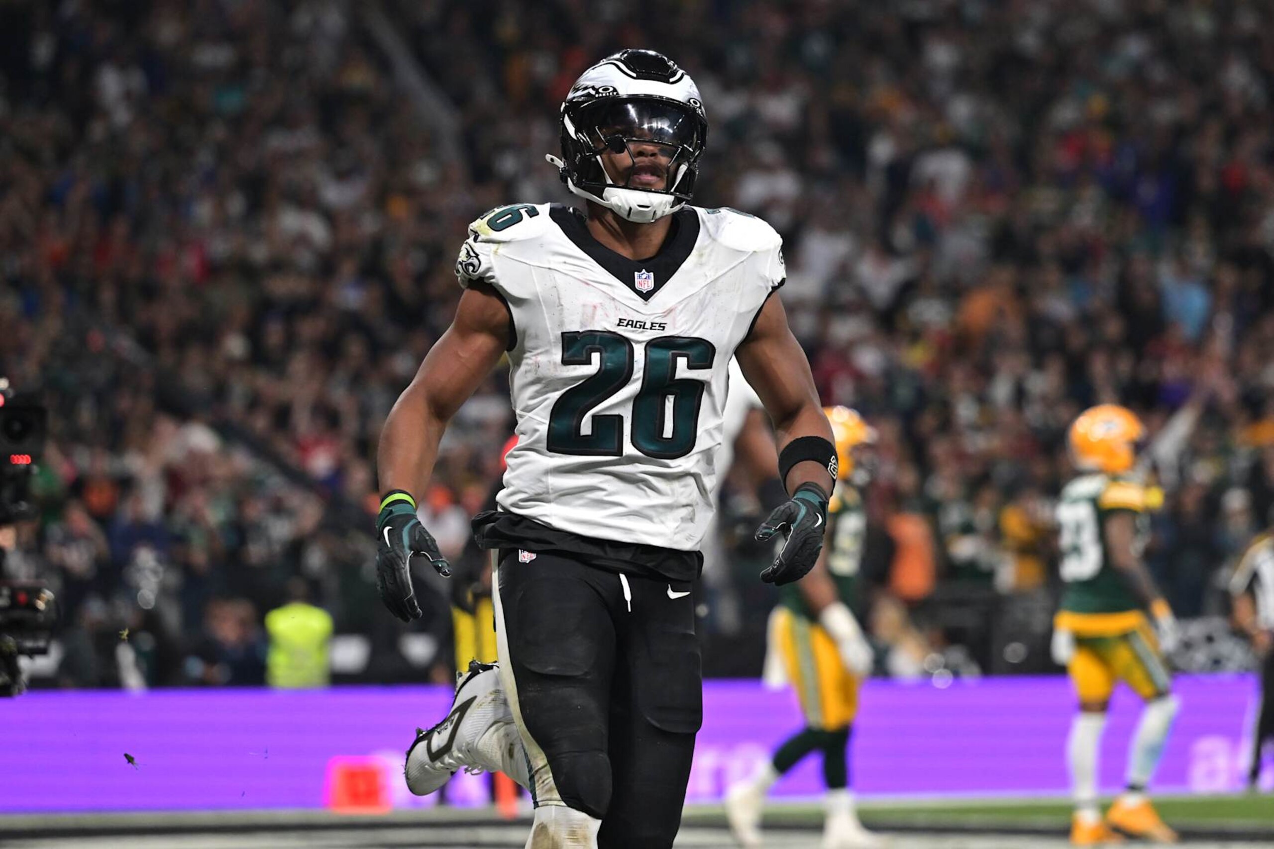 SAO PAULO, BRAZIL - SEPTEMBER 06: Saquon Barkley #26 of the Philadelphia Eagles celebrates after a touchdown during the second quarter against the Green Bay Packers at Arena Corinthians on September 06, 2024 in Sao Paulo, Brazil. (Photo by Pedro Vilela/Getty Images) SAO PAULO, BRAZIL - SEPTEMBER 06: Saquon Barkley #26 of the Philadelphia Eagles celebrates after a touchdown during the second quarter against the Green Bay Packers at Arena Corinthians on September 06, 2024 in Sao Paulo, Brazil. (Photo by Pedro Vilela/Getty Images)