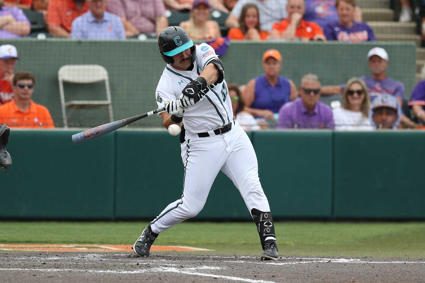 CLEMSON, SC - JUNE 01: Coastal Carolina Chanticleer catcher Derek Bender (53) looks to make contach with the ball during the NCAA Division 1 Regional College Baseball game between the High Point Panthers and the Vanderbilt Commodores on June 1, 2024, at Doug Kingsmore Stadium in Clemson, S.C. (Photo by John Byrum/Icon Sportswire via Getty Images)