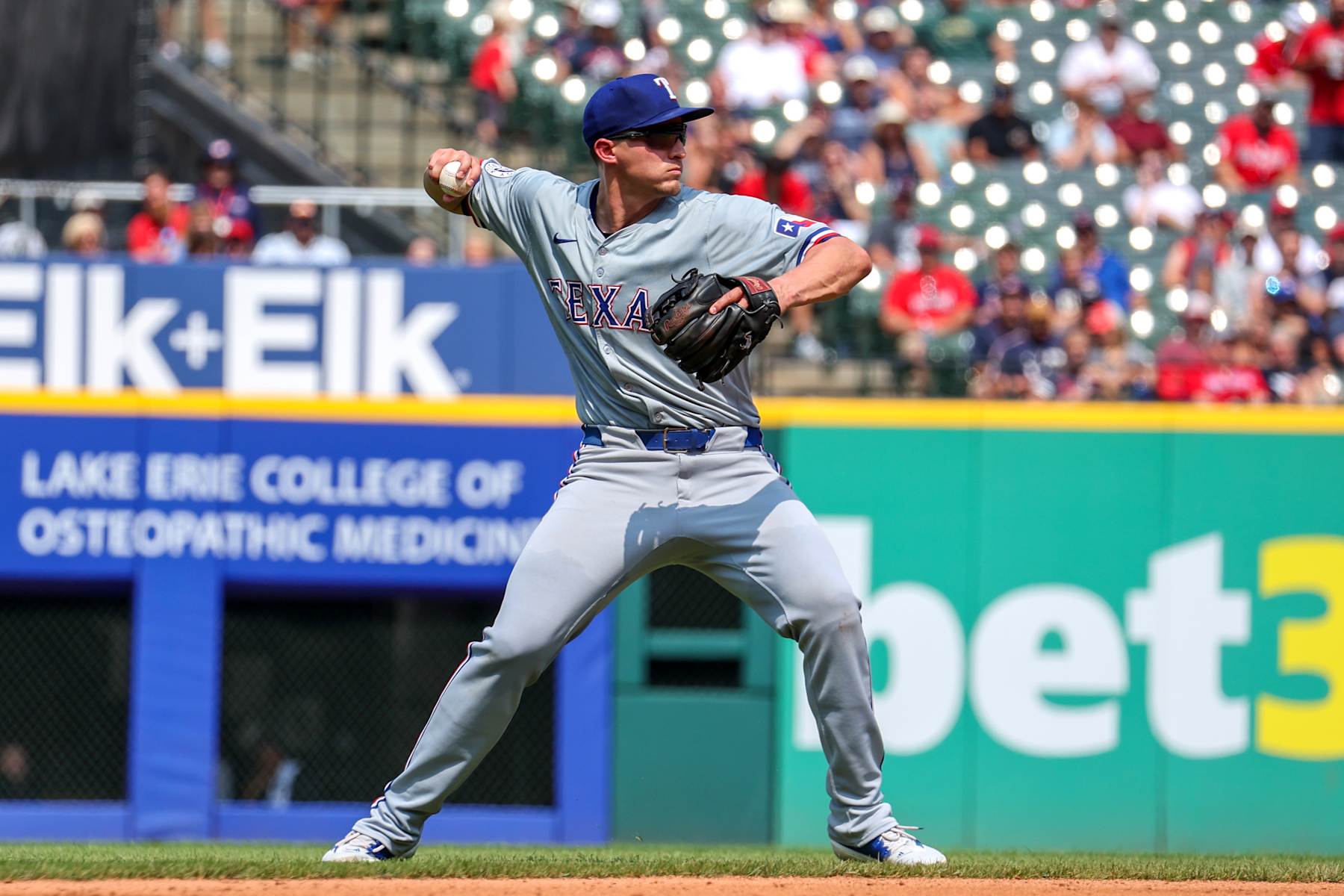 CLEVELAND, OH - AUGUST 25: Texas Rangers shortstop Corey Seager (5) throws to first base for an out during the fourth inning of the Major League Baseball game between the Texas Rangers and Cleveland Guardians on August 25, 2024, at Progressive Field in Cleveland, OH. (Photo by Frank Jansky/Icon Sportswire via Getty Images)