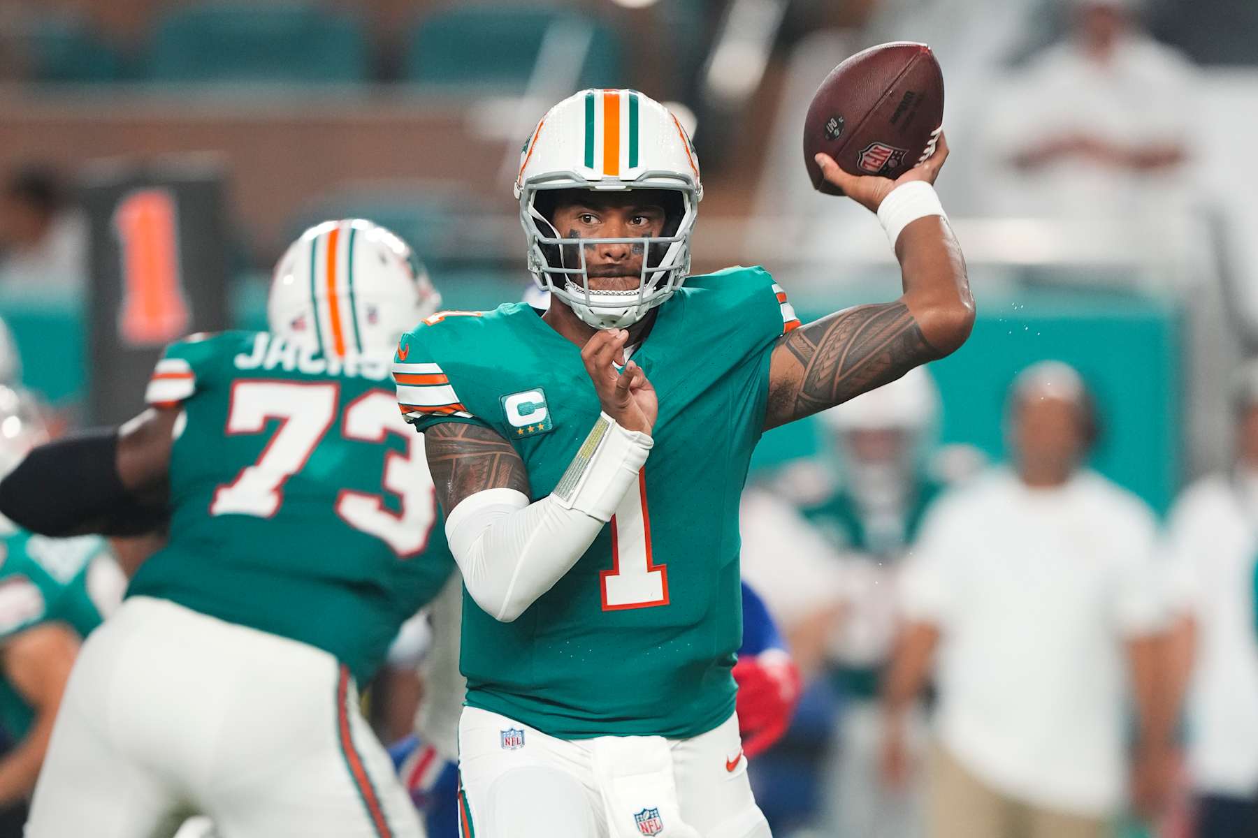 MIAMI GARDENS, FL - SEPTEMBER 12: Miami Dolphins quarterback Tua Tagovailoa (1) makes a pass attempt during the game between the Buffalo Bills and the Miami Dolphins on Thursday, September 12, 2024 at Hard Rock Stadium in Miami Gardens, Fla. (Photo by Peter Joneleit/Icon Sportswire via Getty Images)