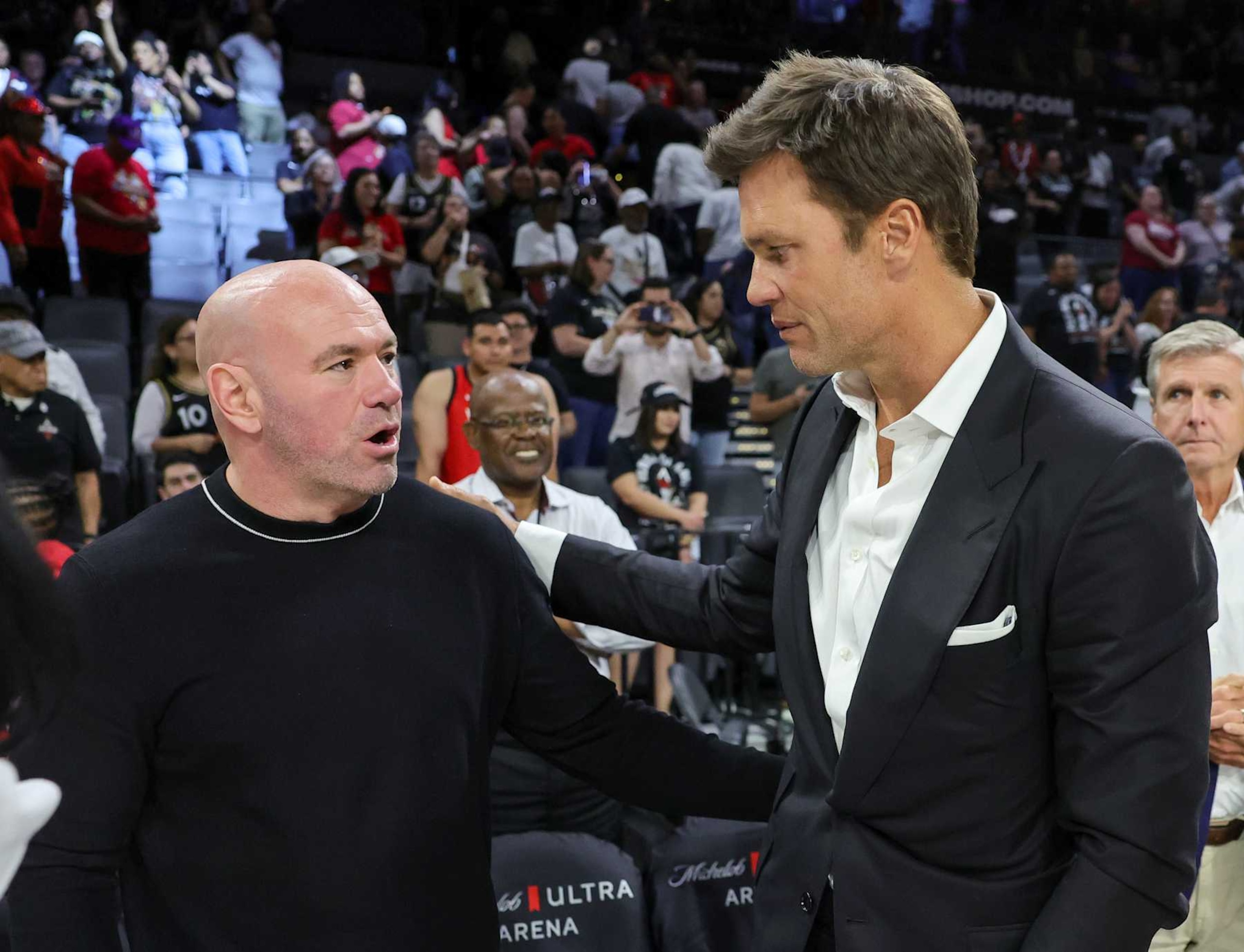 LAS VEGAS, NEVADA - MAY 14: UFC CEO Dana White (L) and Tom Brady talk after the Las Vegas Aces' home opener against the Phoenix Mercury at Michelob ULTRA Arena on May 14, 2024 in Las Vegas, Nevada. The Aces defeated the Mercury 89-80. NOTE TO USER: User expressly acknowledges and agrees that, by downloading and or using this photograph, User is consenting to the terms and conditions of the Getty Images License Agreement. (Photo by Ethan Miller/Getty Images)
