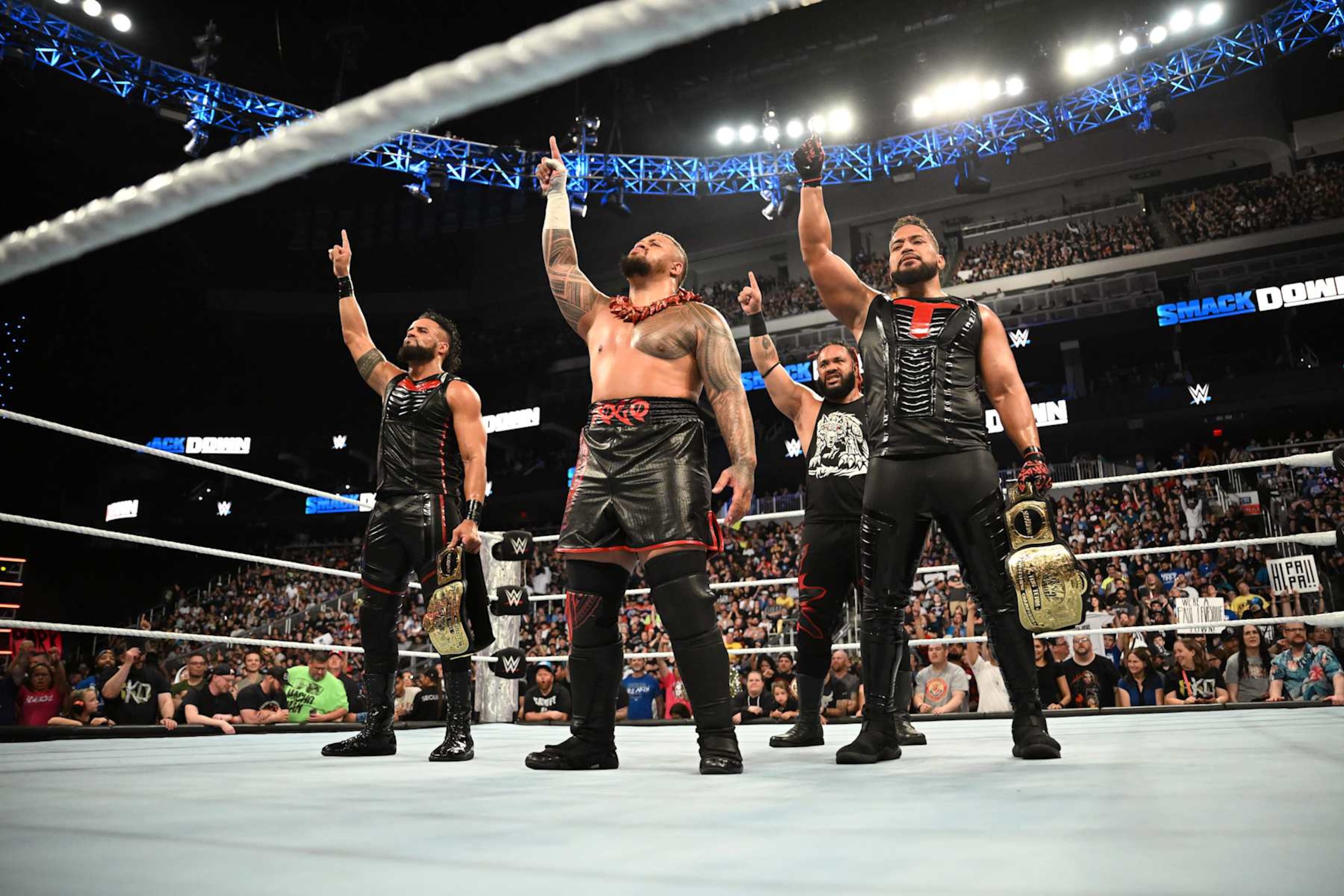 EDMONTON, CANADA - SEPTEMBER 6: Bloodline members (L-R) Tama Tonga, Solo Sikoa, Jacob Fatu and Tonga Loa stand in ring and hold up the #1 sign during WWE Friday Night SmackDown at Rogers Place on September 6, 2024 in Edmonton, Canada.  (Photo by WWE/Getty Images)