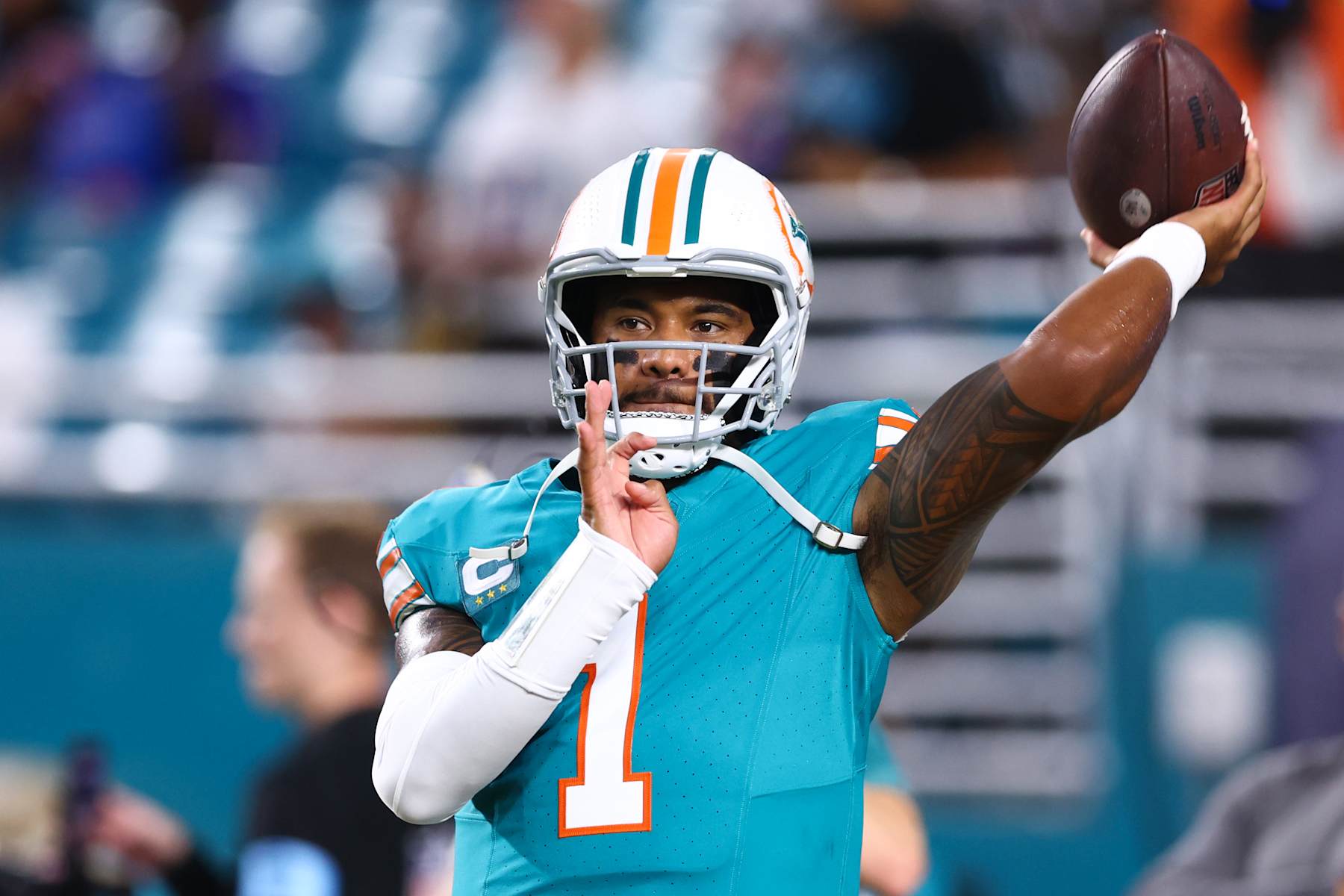 MIAMI GARDENS, FLORIDA - SEPTEMBER 12: Tua Tagovailoa #1 of the Miami Dolphins warms up prior to a game against the Buffalo Bills at Hard Rock Stadium on September 12, 2024 in Miami Gardens, Florida. (Photo by Megan Briggs/Getty Images)
