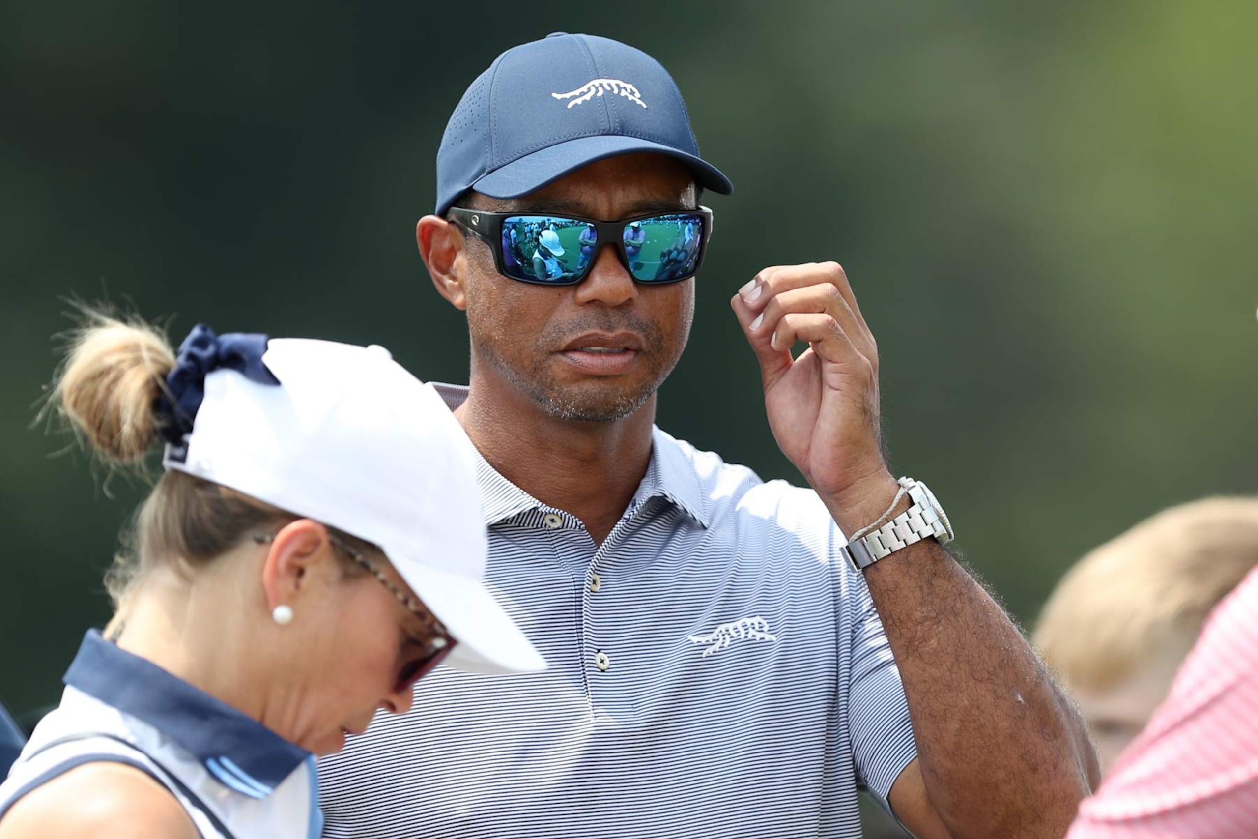 BLOOMFIELD HILLS, MICHIGAN - JULY 23: Tiger Woods of the United States stands near the putting green on day two of the 76th U.S. Junior Amateur Championship on the South Course at Oakland Hills Country Club on July 23, 2024 in Bloomfield Hills, Michigan. (Photo by Raj Mehta/Getty Images)
