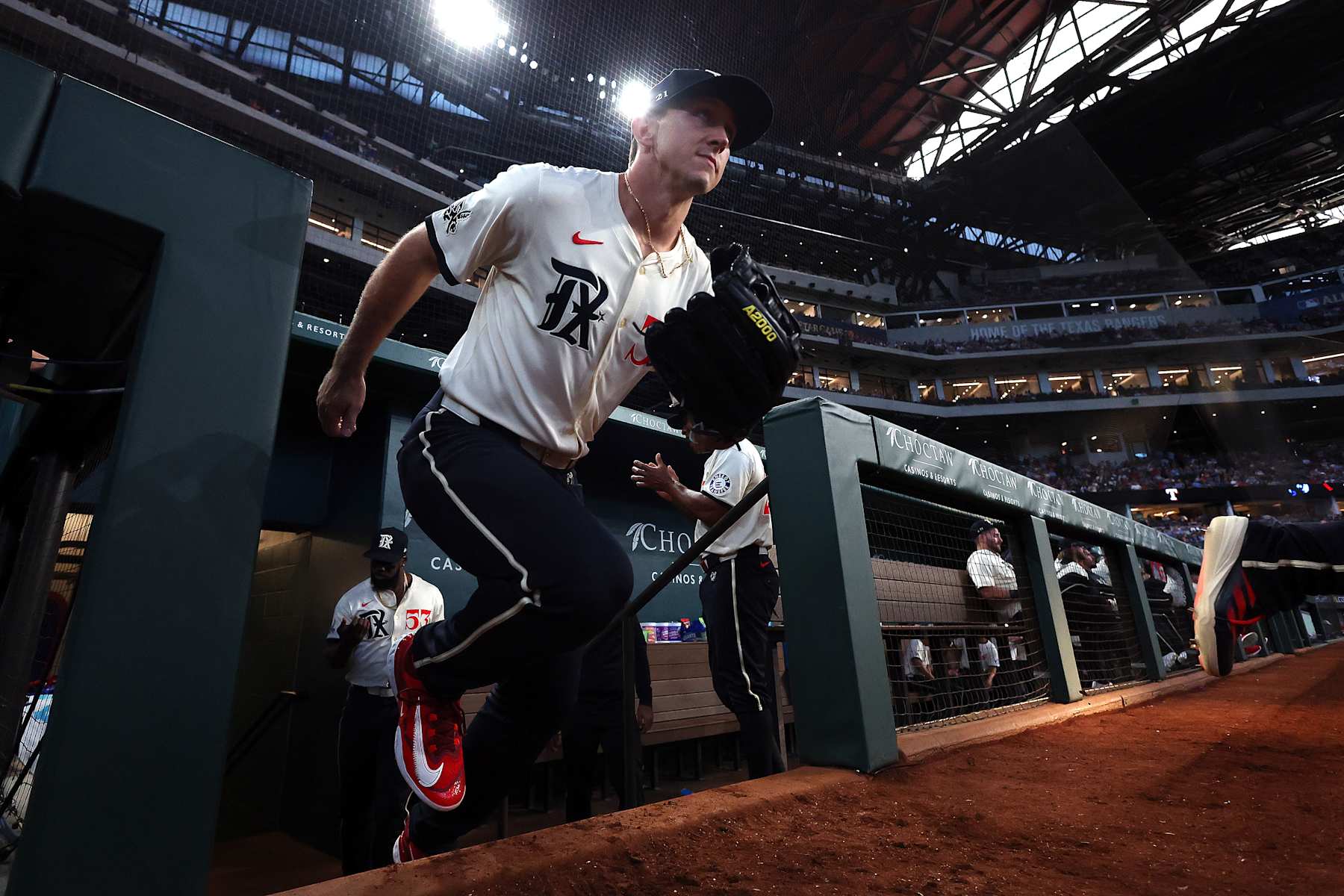 ARLINGTON, TEXAS - JUNE 21: Wyatt Langford #36 of the Texas Rangers runs our of the dugout before the game against the Kansas City Royals at Globe Life Field on June 21, 2024 in Arlington, Texas. (Photo by Richard Rodriguez/Getty Images) ARLINGTON, TEXAS - JUNE 21: Wyatt Langford #36 of the Texas Rangers runs our of the dugout before the game against the Kansas City Royals at Globe Life Field on June 21, 2024 in Arlington, Texas. (Photo by Richard Rodriguez/Getty Images)