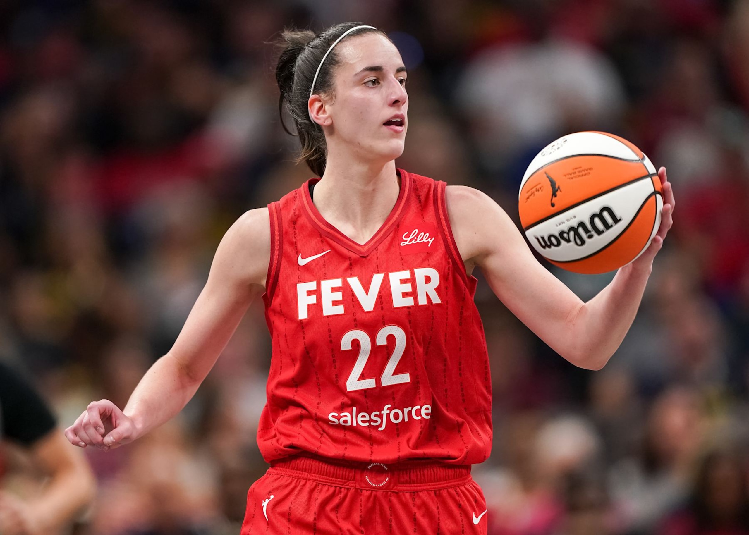 INDIANAPOLIS, INDIANA - SEPTEMBER 11: Caitlin Clark #22 of the Indiana Fever dribbles the ball in the second quarter against the Las Vegas Aces at Gainbridge Fieldhouse on September 11, 2024 in Indianapolis, Indiana. NOTE TO USER: User expressly acknowledges and agrees that, by downloading and or using this photograph, User is consenting to the terms and conditions of the Getty Images License Agreement. (Photo by Dylan Buell/Getty Images) INDIANAPOLIS, INDIANA - SEPTEMBER 11: Caitlin Clark #22 of the Indiana Fever dribbles the ball in the second quarter against the Las Vegas Aces at Gainbridge Fieldhouse on September 11, 2024 in Indianapolis, Indiana. NOTE TO USER: User expressly acknowledges and agrees that, by downloading and or using this photograph, User is consenting to the terms and conditions of the Getty Images License Agreement. (Photo by Dylan Buell/Getty Images)