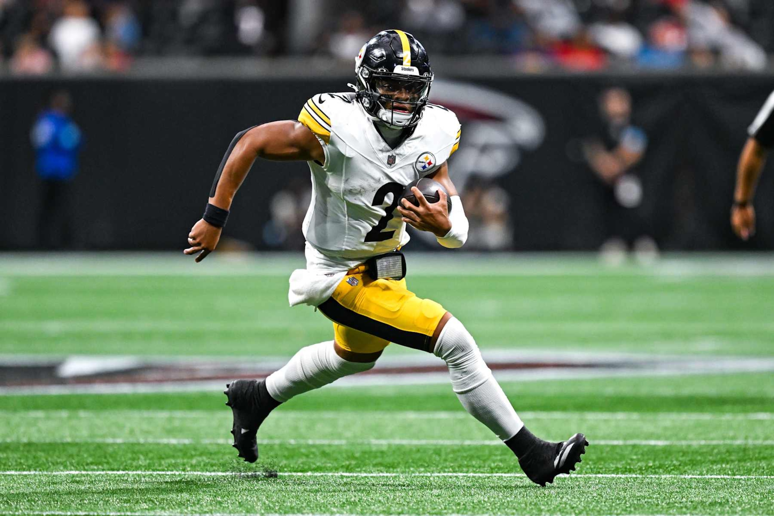 ATLANTA, GA SEPTEMBER 08: Pittsburgh quarterback Justin Fields (2) runs the ball during the NFL game between the Pittsburgh Steelers and the Atlanta Falcons on September 8th, 2024 at Mercedes-Benz Stadium in Atlanta, GA. (Photo by Rich von Biberstein/Icon Sportswire via Getty Images) ATLANTA, GA SEPTEMBER 08: Pittsburgh quarterback Justin Fields (2) runs the ball during the NFL game between the Pittsburgh Steelers and the Atlanta Falcons on September 8th, 2024 at Mercedes-Benz Stadium in Atlanta, GA. (Photo by Rich von Biberstein/Icon Sportswire via Getty Images)