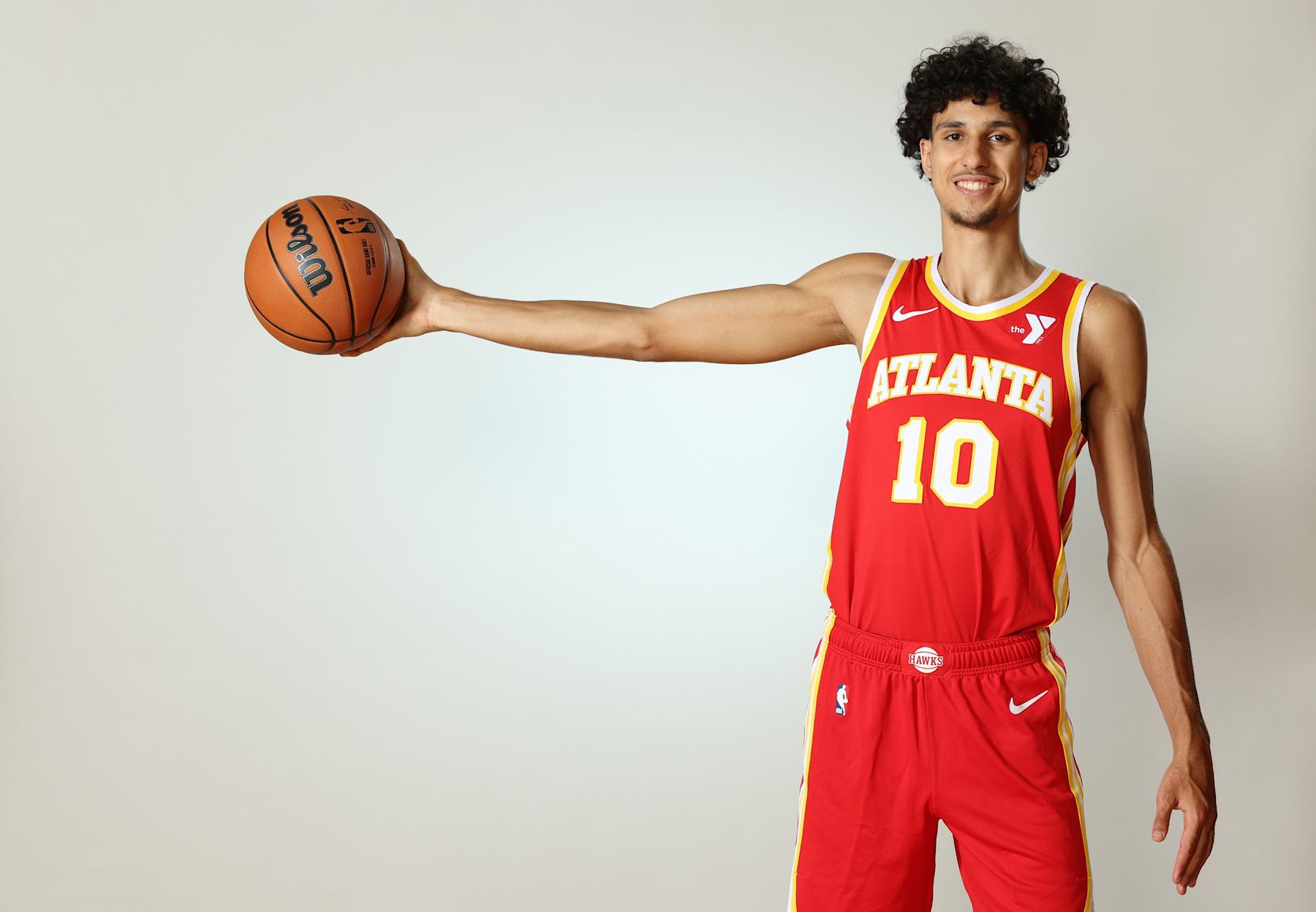 LAS VEGAS, NEVADA - JULY 16: Zaccharie Risacher #10 of the Atlanta Hawks poses for a portrait during the 2024 NBA Rookie Photo Shoot at UNLV on July 16, 2024 in Las Vegas, Nevada.  (Photo by Monica Schipper/Getty Images)