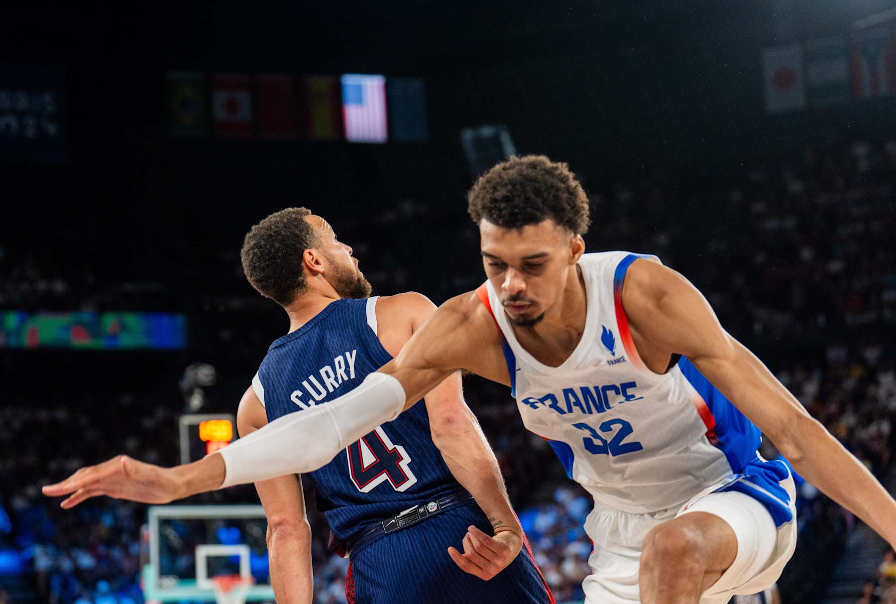 PARIS, FRANCE - AUGUST 10: Stephen Curry (4) of Team USA in action against Victor Wembanyama of France during Men's Gold Medal game between Team France and Team United States on day fifteen of the Olympic Games Paris 2024 at Bercy Arena on August 10, 2024 in Paris, France. (Photo by Aytac Unal/Anadolu via Getty Images)
