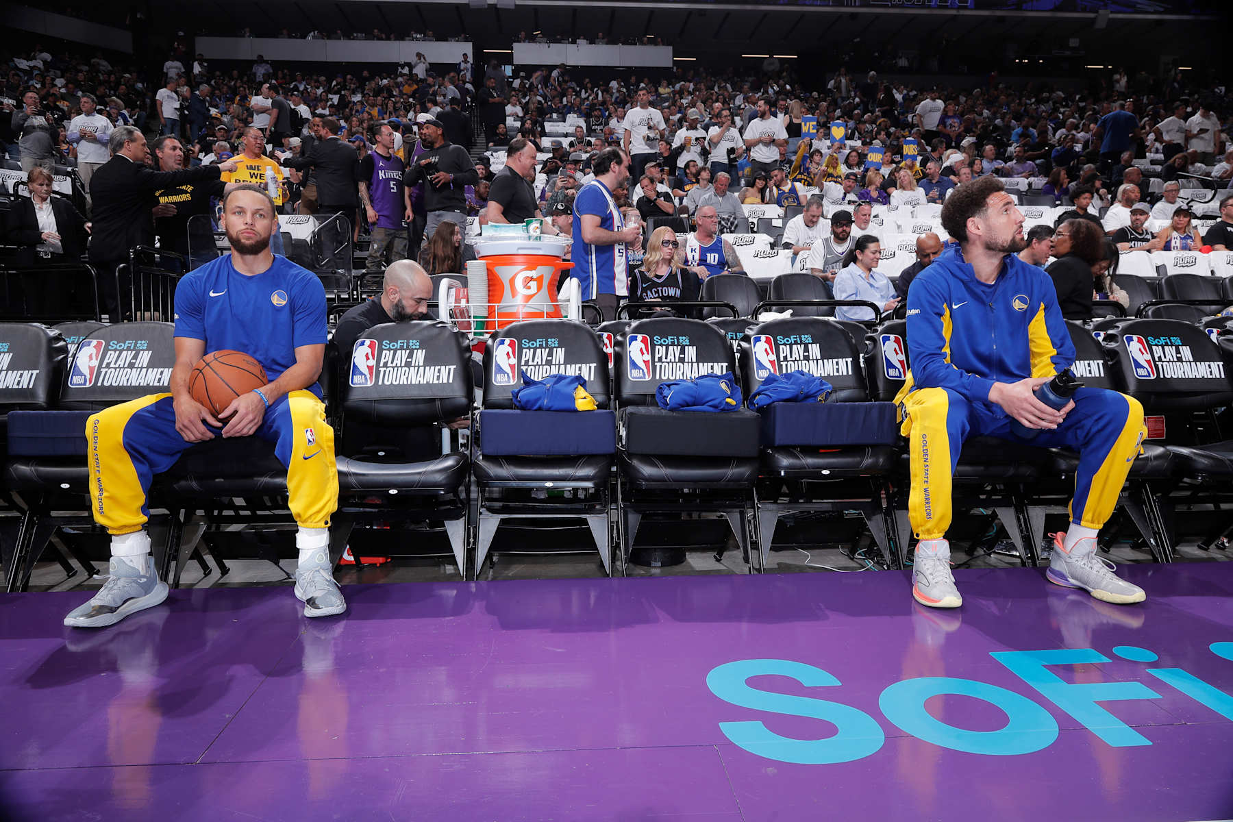 SACRAMENTO, CA - APRIL 16: Stephen Curry #30 and Klay Thompson #11 of the Golden State Warriors look on from the bench prior to the game against the Sacramento Kings during the 2024 Play-In Tournament on April 16, 2024 at Golden 1 Center in Sacramento, California. NOTE TO USER: User expressly acknowledges and agrees that, by downloading and or using this photograph, User is consenting to the terms and conditions of the Getty Images Agreement. Mandatory Copyright Notice: Copyright 2024 NBAE (Photo by Rocky Widner/NBAE via Getty Images)