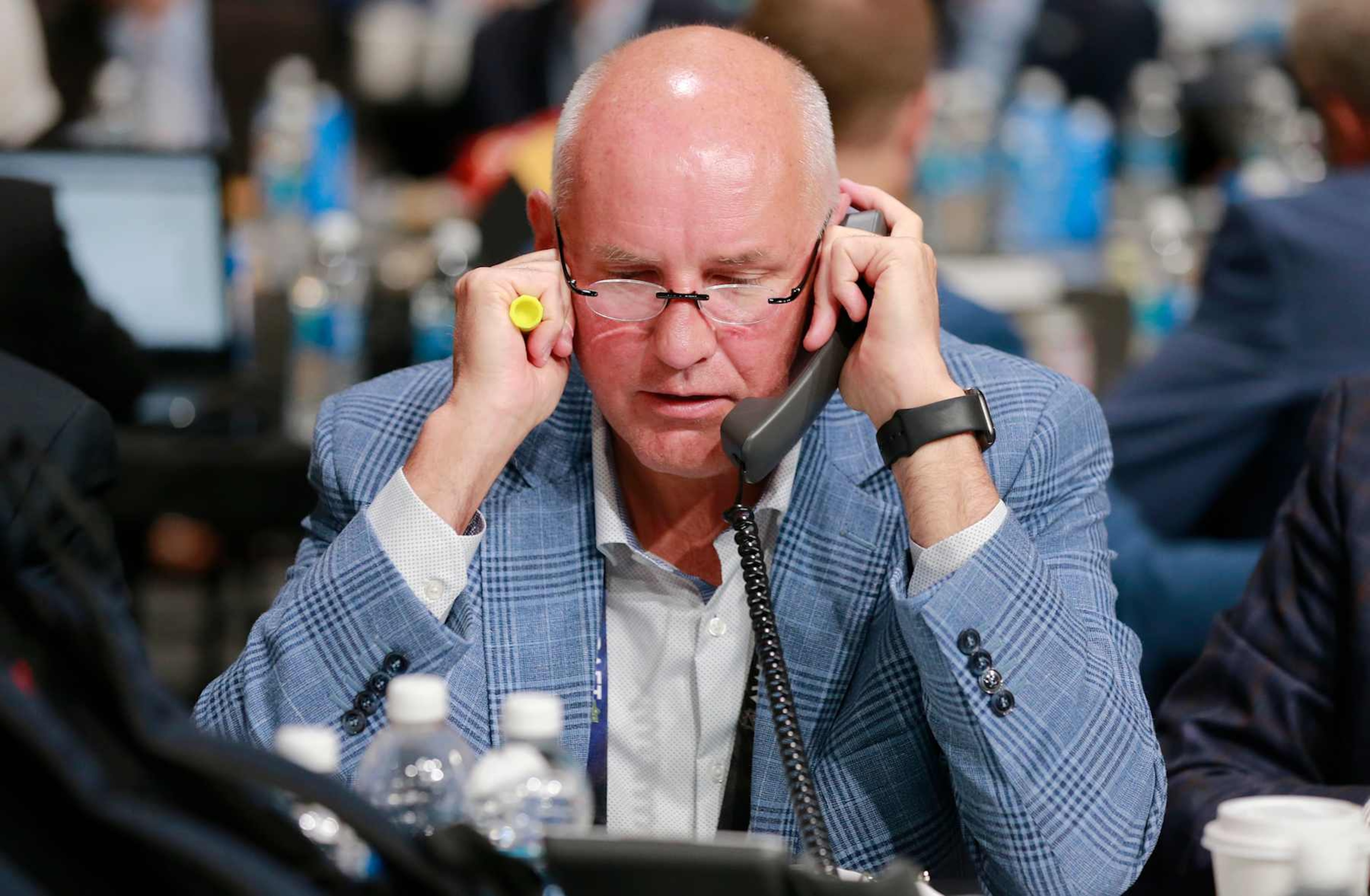 NASHVILLE, TENNESSEE - JUNE 29: General manager Doug Armstrong of the St. Louis Blues talks on his phone during the 2023 Upper Deck NHL Draft - Rounds 2-7 at Bridgestone Arena on June 29, 2023 in Nashville, Tennessee. (Photo by Jeff Vinnick/NHLI via Getty Images)
