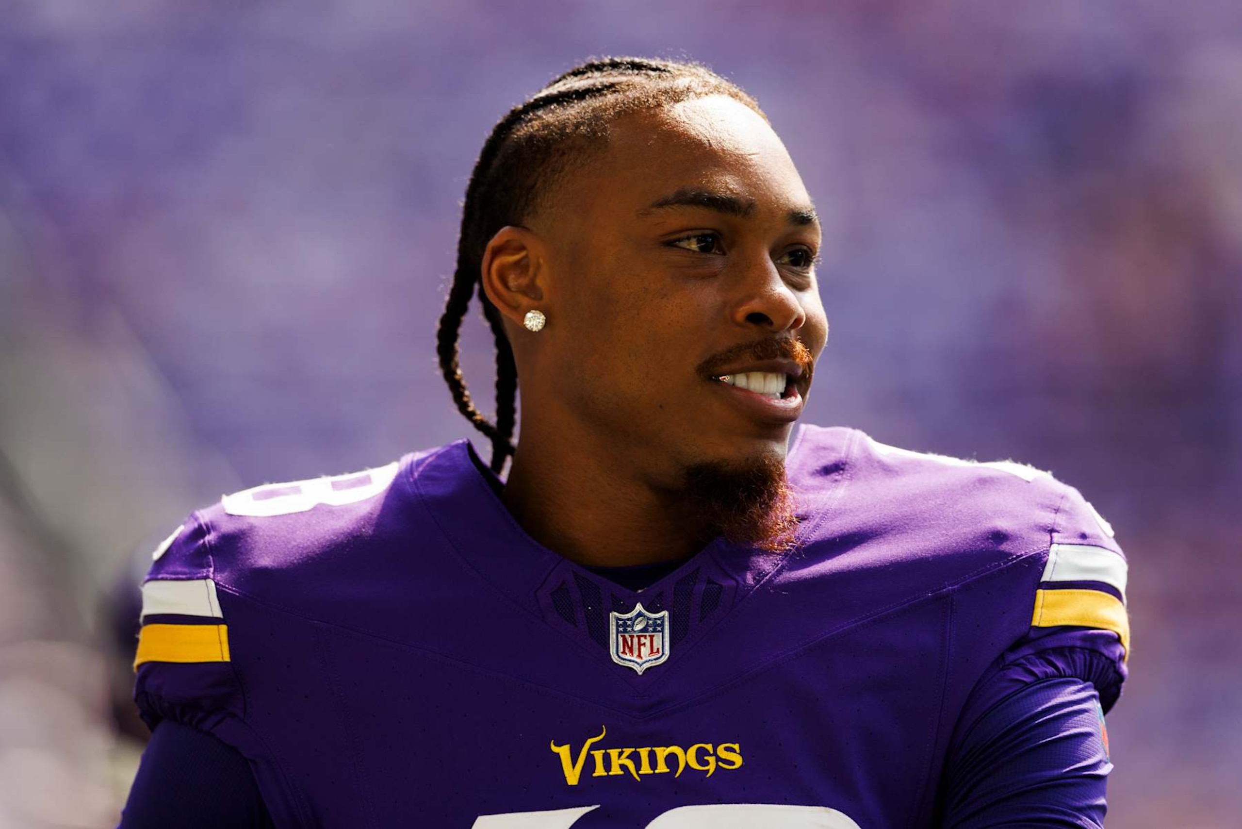 MINNEAPOLIS, MINNESOTA - AUGUST 10: Justin Jefferson #18 of the Minnesota Vikings on the sideline during a preseason game against the Las Vegas Raiders at U.S. Bank Stadium on August 10, 2024 in Minneapolis, Minnesota. (Photo by Ric Tapia/Getty Images) MINNEAPOLIS, MINNESOTA - AUGUST 10: Justin Jefferson #18 of the Minnesota Vikings on the sideline during a preseason game against the Las Vegas Raiders at U.S. Bank Stadium on August 10, 2024 in Minneapolis, Minnesota. (Photo by Ric Tapia/Getty Images)