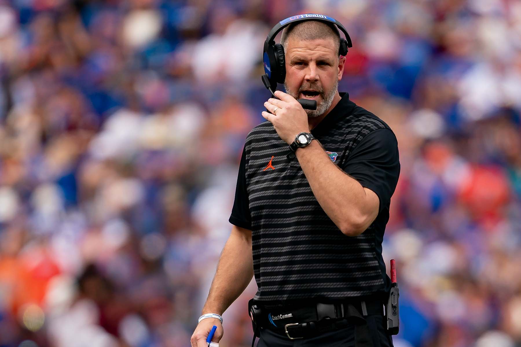 GAINESVILLE, FL - SEPTEMBER 14: Florida Gators head coach Billy Napier talks into the headset during a college football game between the Texas A&M Aggies and the Florida Gators on September 14th, 2024 at Ben Hill Griffin Stadium in Gainesville, FL. (Photo by Chris Leduc/Icon Sportswire via Getty Images)