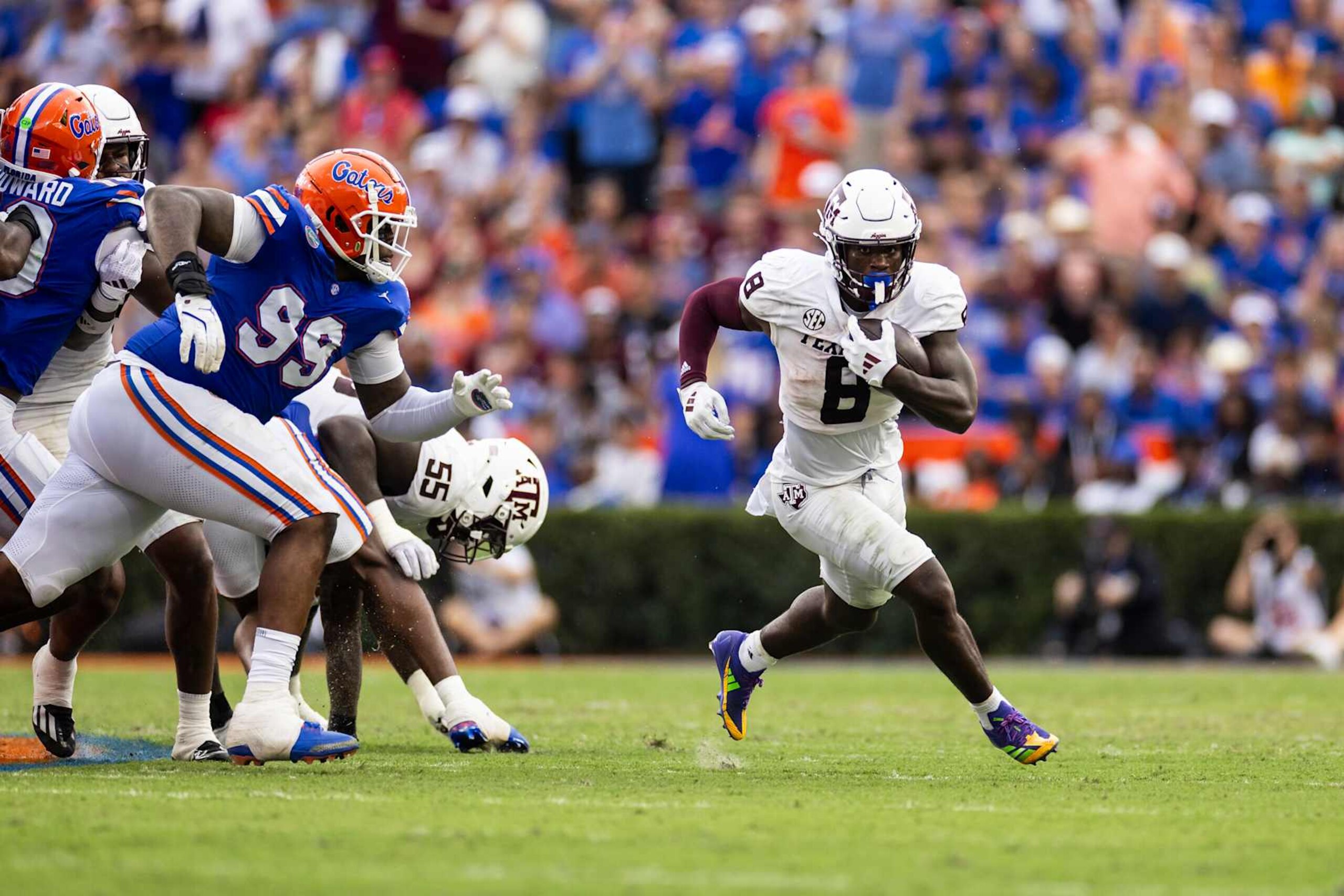 GAINESVILLE, FLORIDA - SEPTEMBER 14: Le'Veon Moss #8 of the Texas A&M Aggies runs with the ball during the first half of a game against the Florida Gators at Ben Hill Griffin Stadium on September 14, 2024 in Gainesville, Florida. (Photo by James Gilbert/Getty Images)