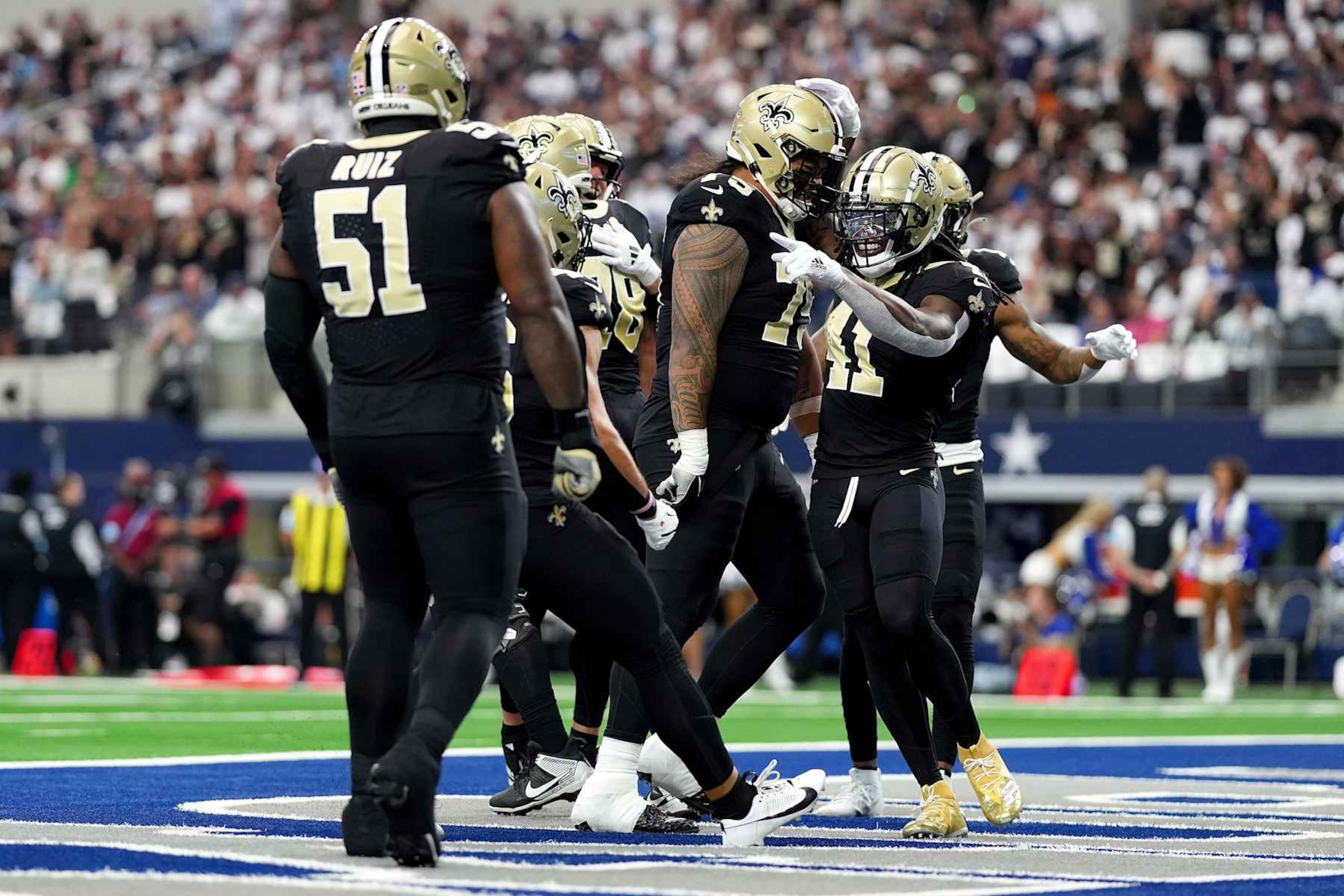 ARLINGTON, TEXAS - SEPTEMBER 15: Alvin Kamara #41 of the New Orleans Saints celebrates a touchdown with teammates during the first quarter at AT&T Stadium on September 15, 2024 in Arlington, Texas. (Photo by Sam Hodde/Getty Images)