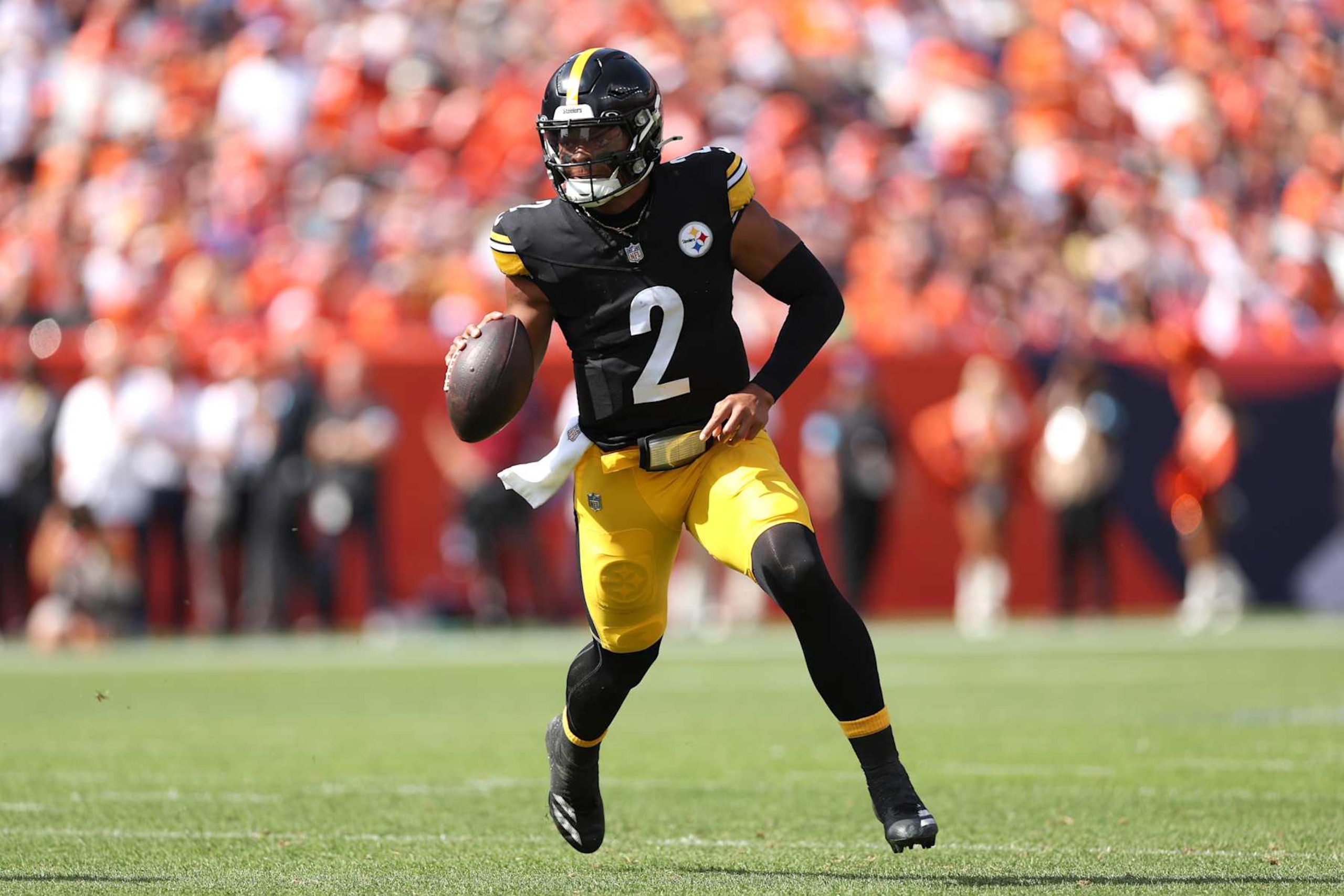 DENVER, COLORADO - SEPTEMBER 15: Justin Fields #2 of the Pittsburgh Steelers looks to pass during the first half against the Denver Broncos at Empower Field At Mile High on September 15, 2024 in Denver, Colorado. (Photo by Matthew Stockman/Getty Images)