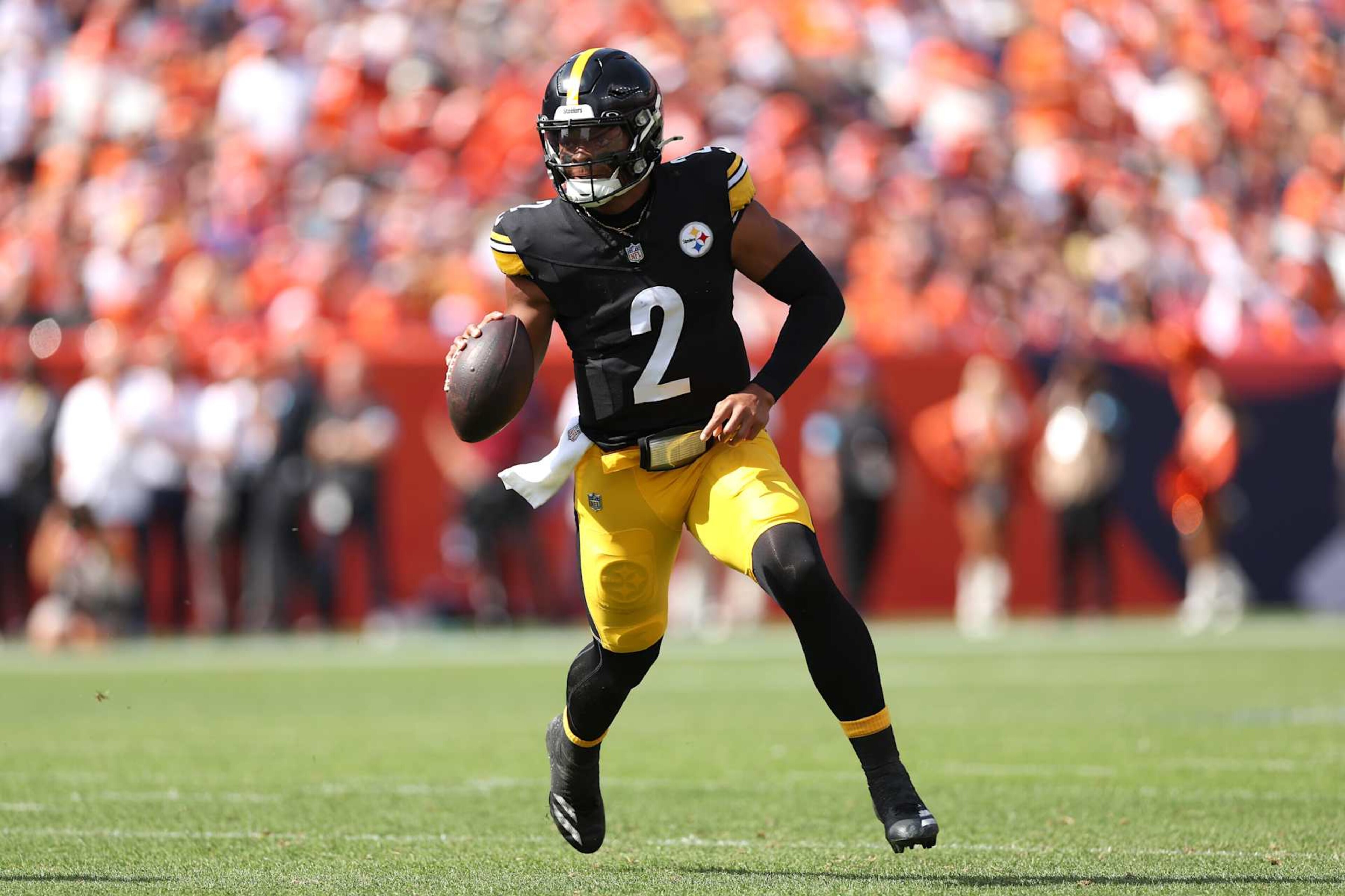 DENVER, COLORADO - SEPTEMBER 15: Justin Fields #2 of the Pittsburgh Steelers looks to pass during the first half against the Denver Broncos at Empower Field At Mile High on September 15, 2024 in Denver, Colorado. (Photo by Matthew Stockman/Getty Images)