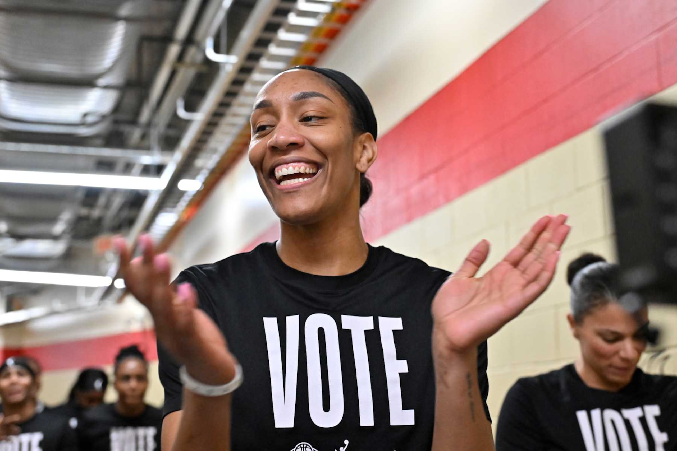 LAS VEGAS, NV - SEPTEMBER 15: A'ja Wilson #22 of the Las Vegas Aces smiles before the game against the Connecticut Sun on September 15, 2024 at Michelob ULTRA Arena in Las Vegas, Nevada. NOTE TO USER: User expressly acknowledges and agrees that, by downloading and or using this photograph, User is consenting to the terms and conditions of the Getty Images License Agreement. Mandatory Copyright Notice: Copyright 2024 NBAE (Photo by David Becker/NBAE via Getty Images)