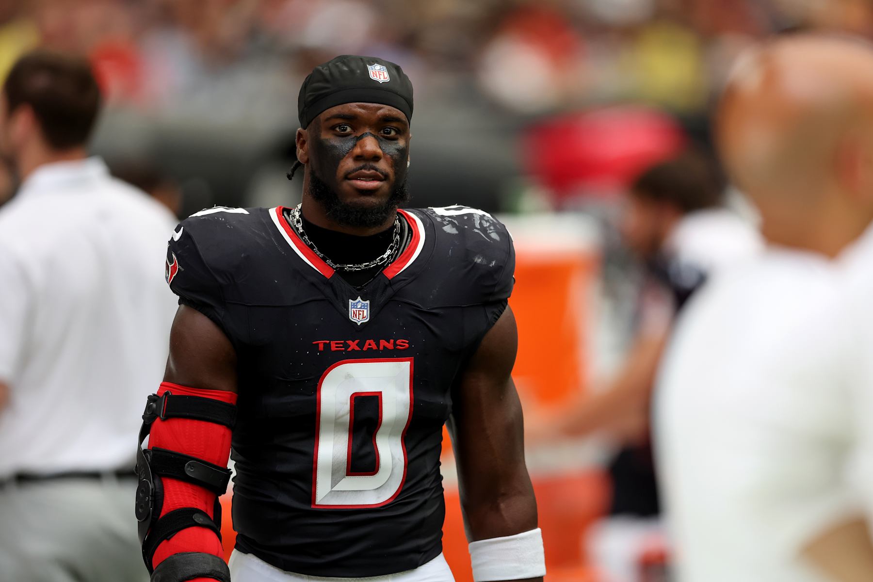 HOUSTON, TEXAS - AUGUST 17: Azeez Al-Shaair #0 of the Houston Texans reacts on the sideline in the first half against the New York Giants during the preseason game at NRG Stadium on August 17, 2024 in Houston, Texas. (Photo by Tim Warner/Getty Images)