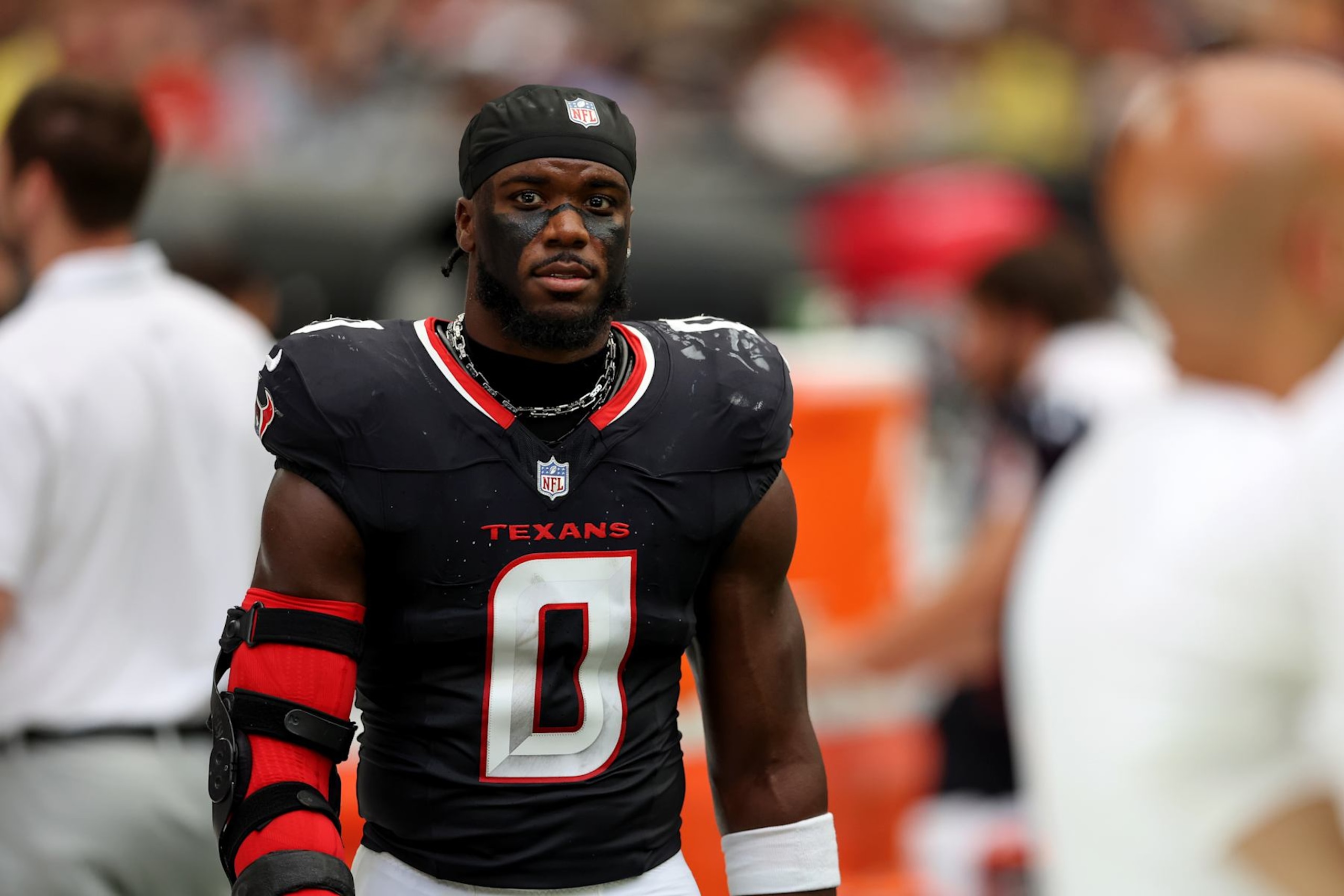 HOUSTON, TEXAS - AUGUST 17: Azeez Al-Shaair #0 of the Houston Texans reacts on the sideline in the first half against the New York Giants during the preseason game at NRG Stadium on August 17, 2024 in Houston, Texas. (Photo by Tim Warner/Getty Images) HOUSTON, TEXAS - AUGUST 17: Azeez Al-Shaair #0 of the Houston Texans reacts on the sideline in the first half against the New York Giants during the preseason game at NRG Stadium on August 17, 2024 in Houston, Texas. (Photo by Tim Warner/Getty Images)