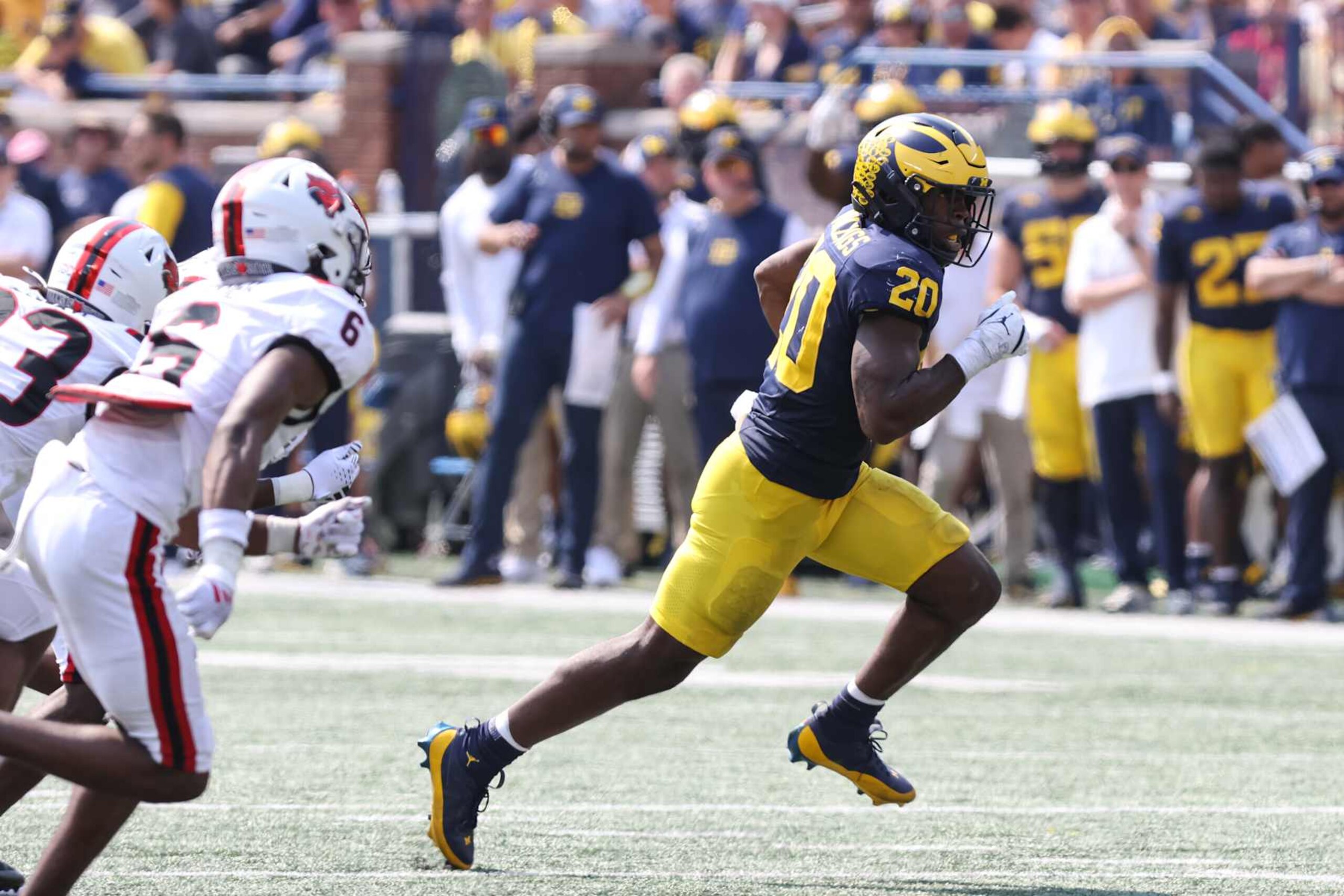 ANN ARBOR, MI - SEPTEMBER 14:  Michigan Wolverines running back Kalel Mullings (20) runs with the ball during the second quarter of a non-conference college football game between the Arkansas State Red Wolves and the Michigan Wolverines on September 14, 2024 at Michigan Stadium in Ann Arbor, Michigan.  (Photo by Scott W. Grau/Icon Sportswire via Getty Images)