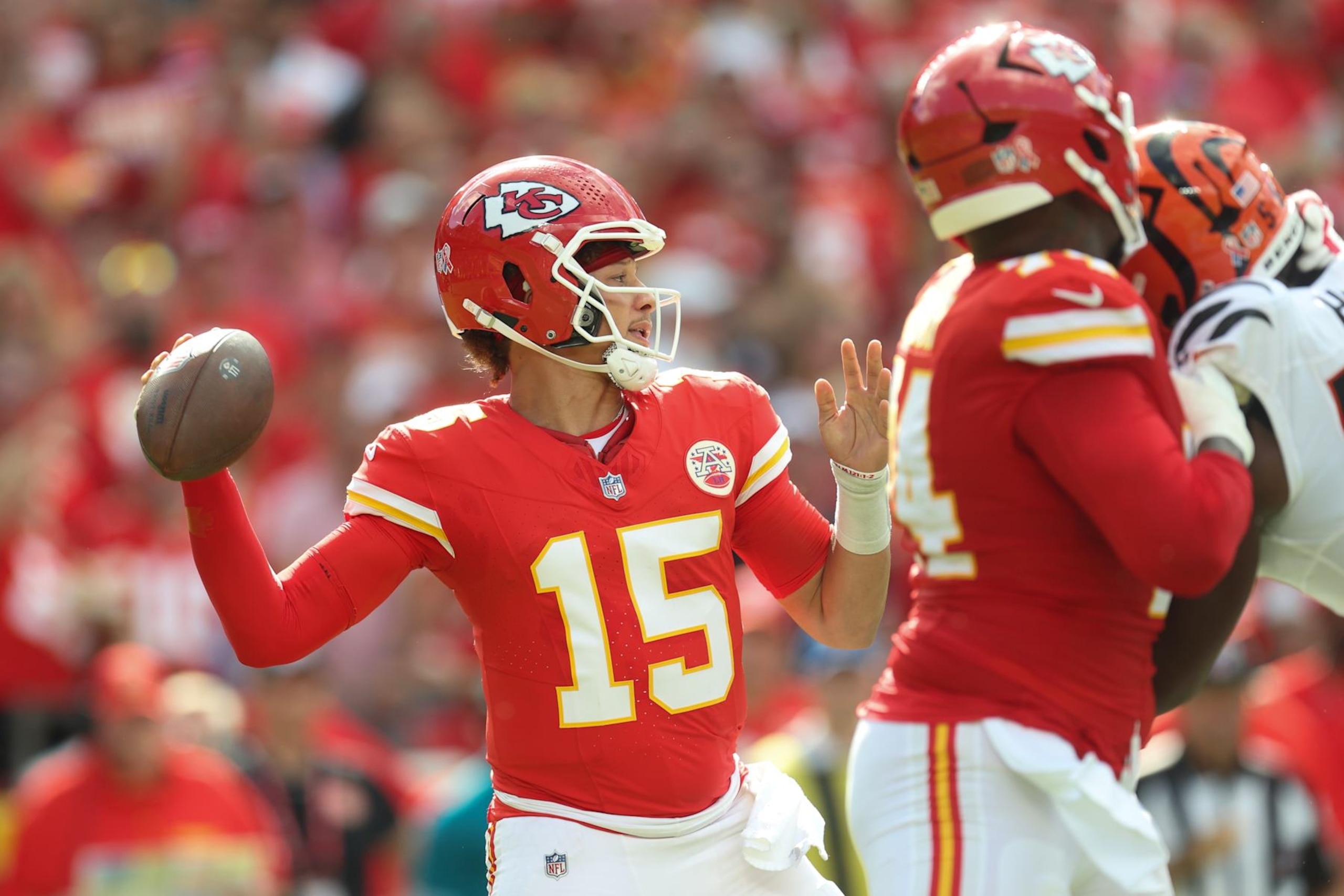 KANSAS CITY, MISSOURI - SEPTEMBER 15: Quarterback Patrick Mahomes #15 of the Kansas City Chiefs throws a pass against the Cincinnati Bengals during the first quarter at GEHA Field at Arrowhead Stadium on September 15, 2024 in Kansas City, Missouri. (Photo by Jamie Squire/Getty Images) KANSAS CITY, MISSOURI - SEPTEMBER 15: Quarterback Patrick Mahomes #15 of the Kansas City Chiefs throws a pass against the Cincinnati Bengals during the first quarter at GEHA Field at Arrowhead Stadium on September 15, 2024 in Kansas City, Missouri. (Photo by Jamie Squire/Getty Images)