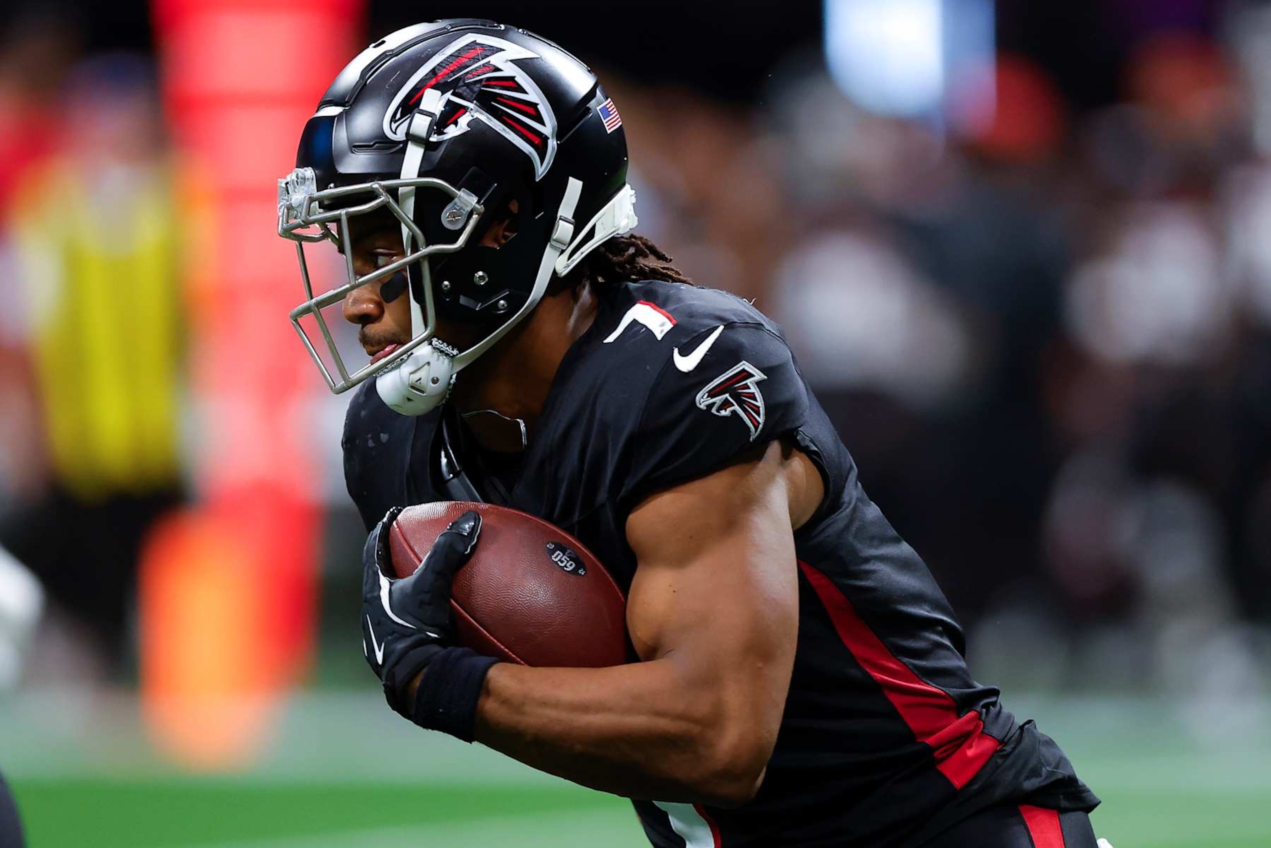 ATLANTA, GEORGIA - SEPTEMBER 8: Bijan Robinson #7 of the Atlanta Falcons rushes during the third quarter against the Pittsburgh Steelers at Mercedes-Benz Stadium on September 8, 2024 in Atlanta, Georgia. (Photo by Todd Kirkland/Getty Images) ATLANTA, GEORGIA - SEPTEMBER 8: Bijan Robinson #7 of the Atlanta Falcons rushes during the third quarter against the Pittsburgh Steelers at Mercedes-Benz Stadium on September 8, 2024 in Atlanta, Georgia. (Photo by Todd Kirkland/Getty Images)