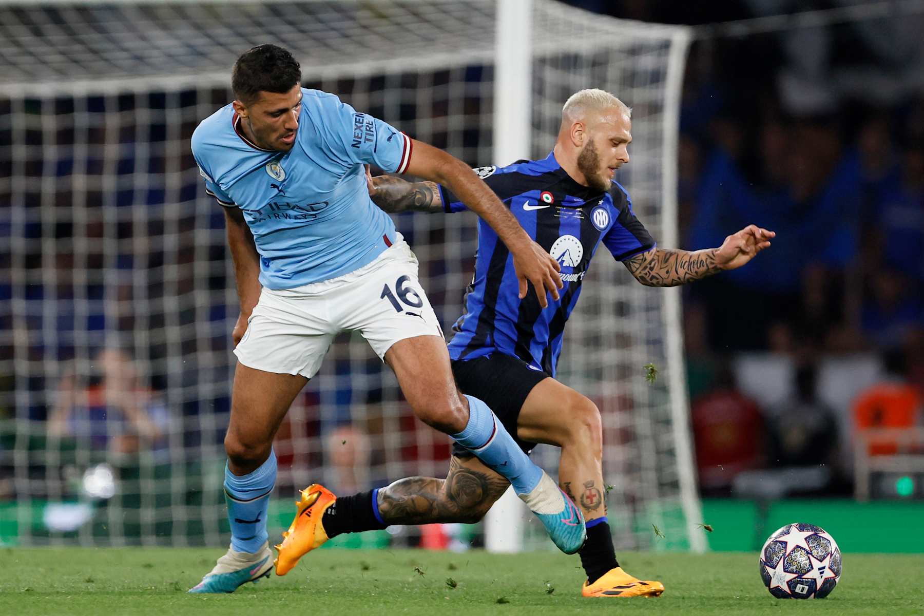 ISTANBUL, TURKEY - JUNE 10: Federico Dimarco of FC Internazionale dribbles past Rodri Hernandez of Manchester City during the UEFA Champions League 2022/23 final match at Ataturk Olympic Stadium on June 10, 2023 in Istanbul, Turkey. (Photo by Richard Sellers/Allstar/Getty Images)