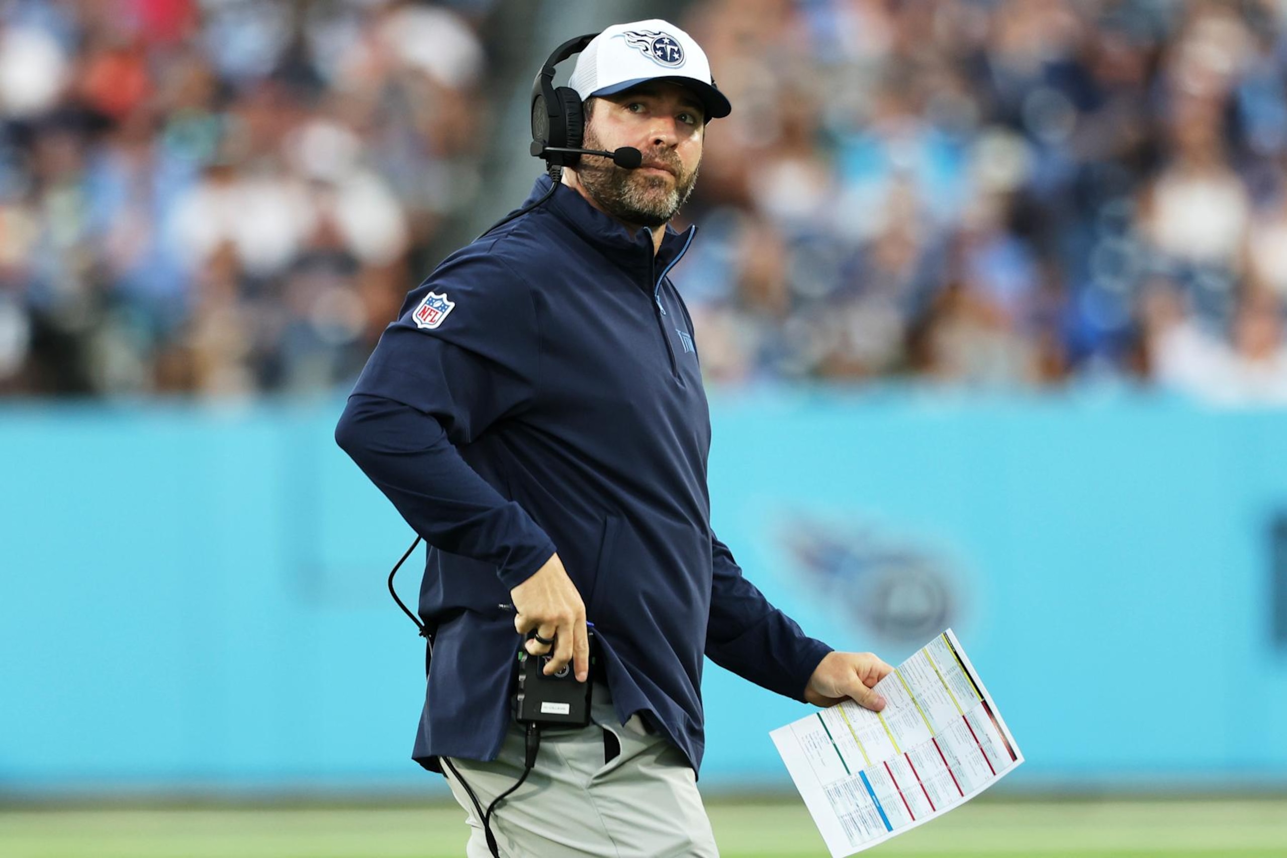 NASHVILLE, TENNESSEE - AUGUST 17: Head Coach Brian Callahan of the Tennessee Titans looks on during the second half of the game against the Seattle Seahawks at Nissan Stadium on August 17, 2024 in Nashville, Tennessee.  (Photo by Johnnie Izquierdo/Getty Images)