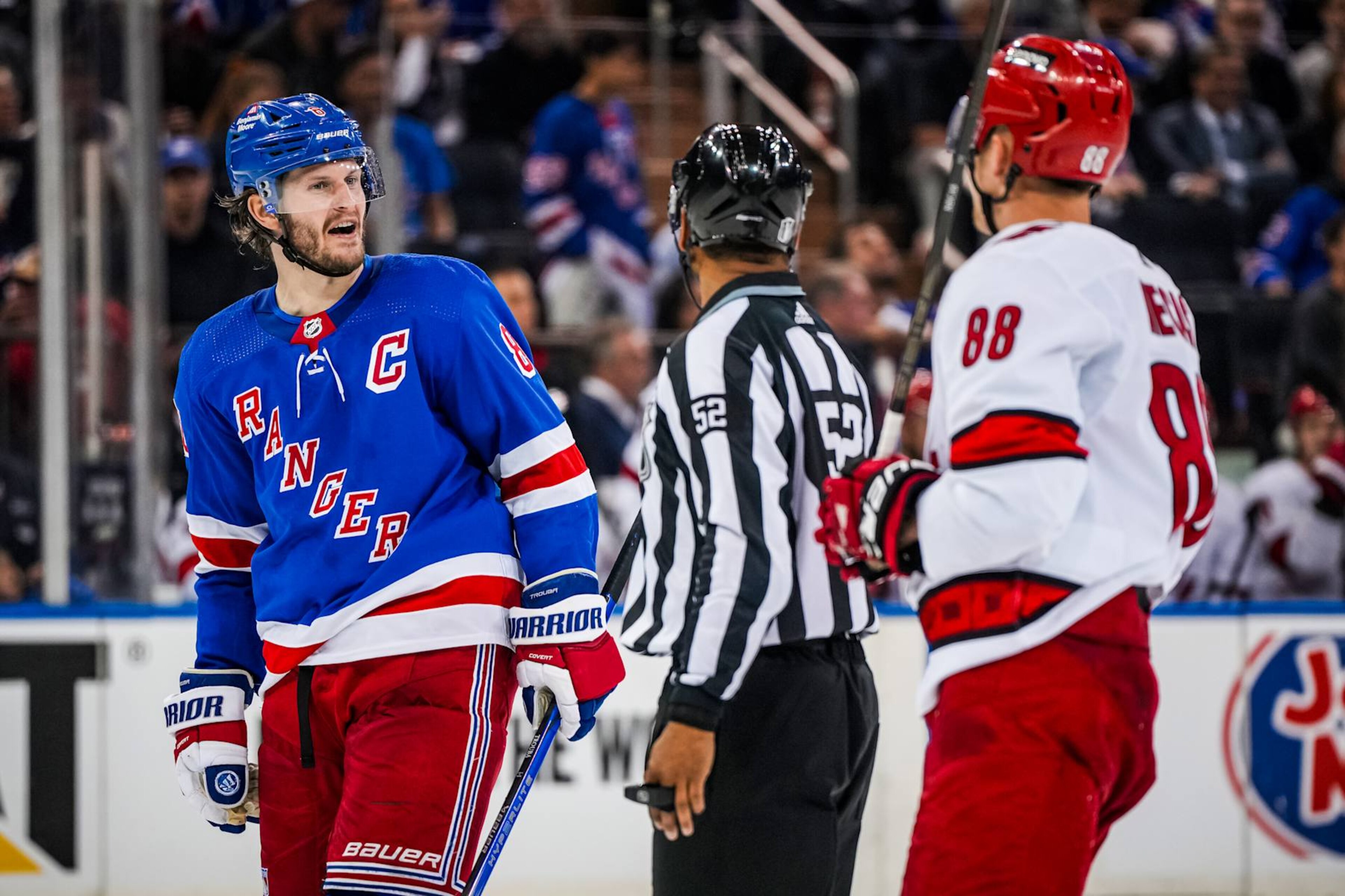 NEW YORK, NEW YORK - MAY 07: Jacob Trouba #8 of the New York Rangers has words with Martin Necas #88 of the Carolina Hurricanes during overtime in Game Two of the Second Round of the 2024 Stanley Cup Playoffs at Madison Square Garden on May 07, 2024 in New York City. (Photo by Josh Lavallee/NHLI via Getty Images) NEW YORK, NEW YORK - MAY 07: Jacob Trouba #8 of the New York Rangers has words with Martin Necas #88 of the Carolina Hurricanes during overtime in Game Two of the Second Round of the 2024 Stanley Cup Playoffs at Madison Square Garden on May 07, 2024 in New York City. (Photo by Josh Lavallee/NHLI via Getty Images)