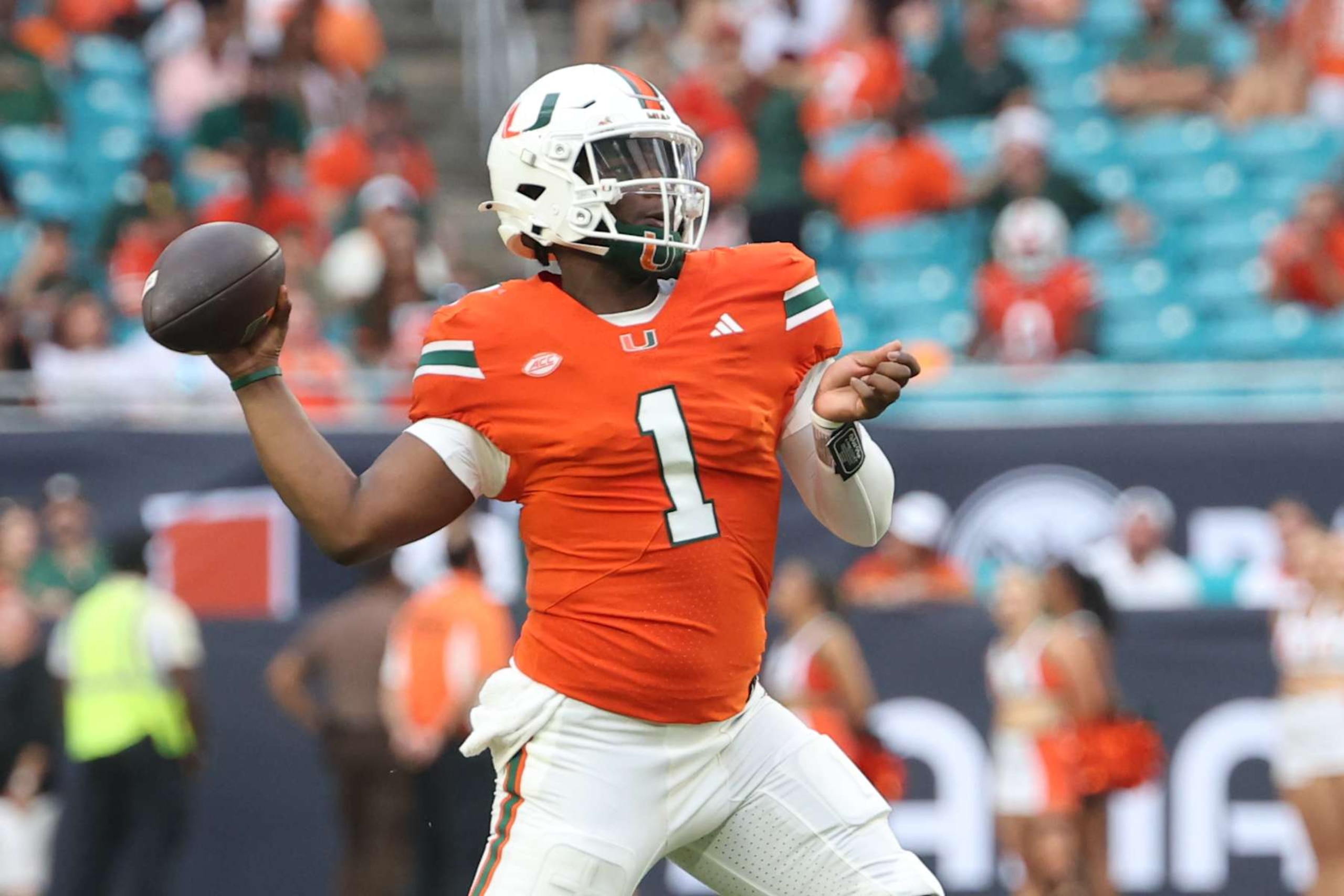 MIAMI GARDENS, FL - SEPTEMBER 14: Miami Hurricanes quarterback Cam Ward (1) makes a pass attempt during the game between the Ball State Cardinals and the Miami Hurricanes on Saturday, September 14, 2024 at Hard Rock Stadium in Miami Gardens, Fla. (Photo by Peter Joneleit/Icon Sportswire via Getty Images)