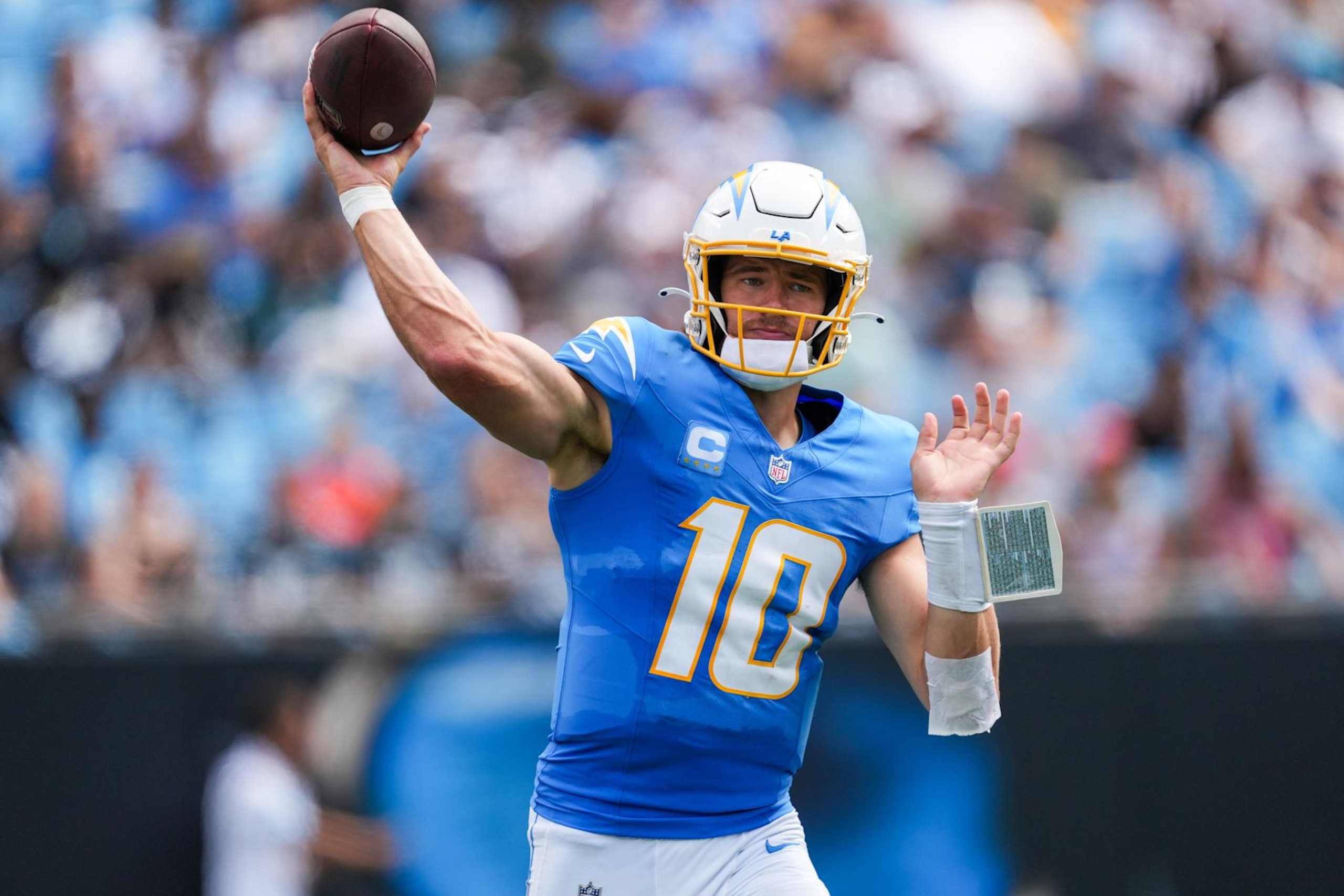 CHARLOTTE, NORTH CAROLINA - SEPTEMBER 15: Justin Herbert #10 of the Los Angeles Chargers looks to pass against the Carolina Panthers during the game at Bank of America Stadium on September 15, 2024 in Charlotte, North Carolina. (Photo by Grant Halverson/Getty Images)