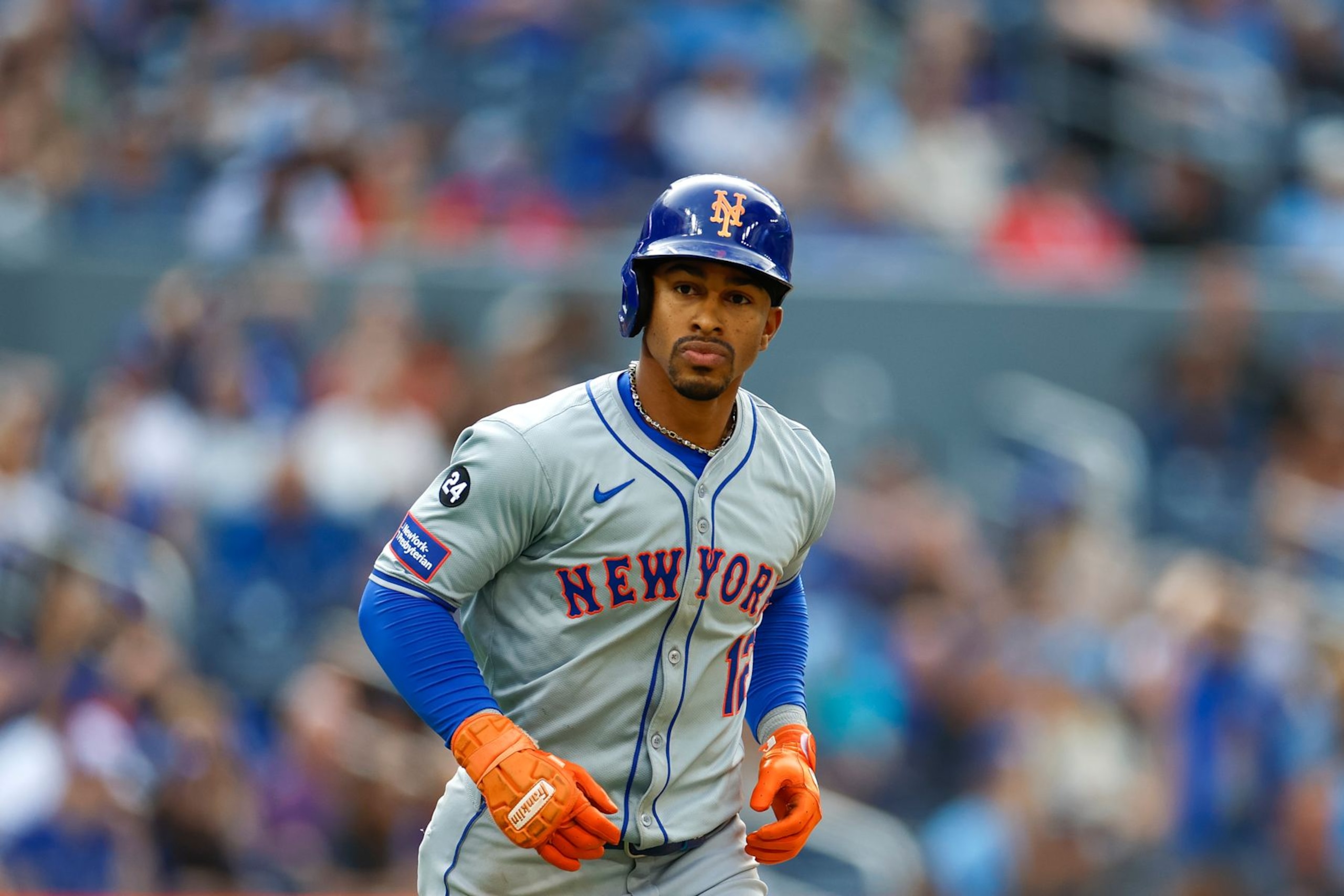 TORONTO, CANADA - SEPTEMBER 11: Francisco Lindor #12 of the New York Mets reacts after hitting a solo home run in the ninth inning during a game against the Toronto Blue Jays at Rogers Centre on September 11, 2024 in Toronto, Canada. (Photo by Brandon Sloter/Image Of Sport/Getty Images)
