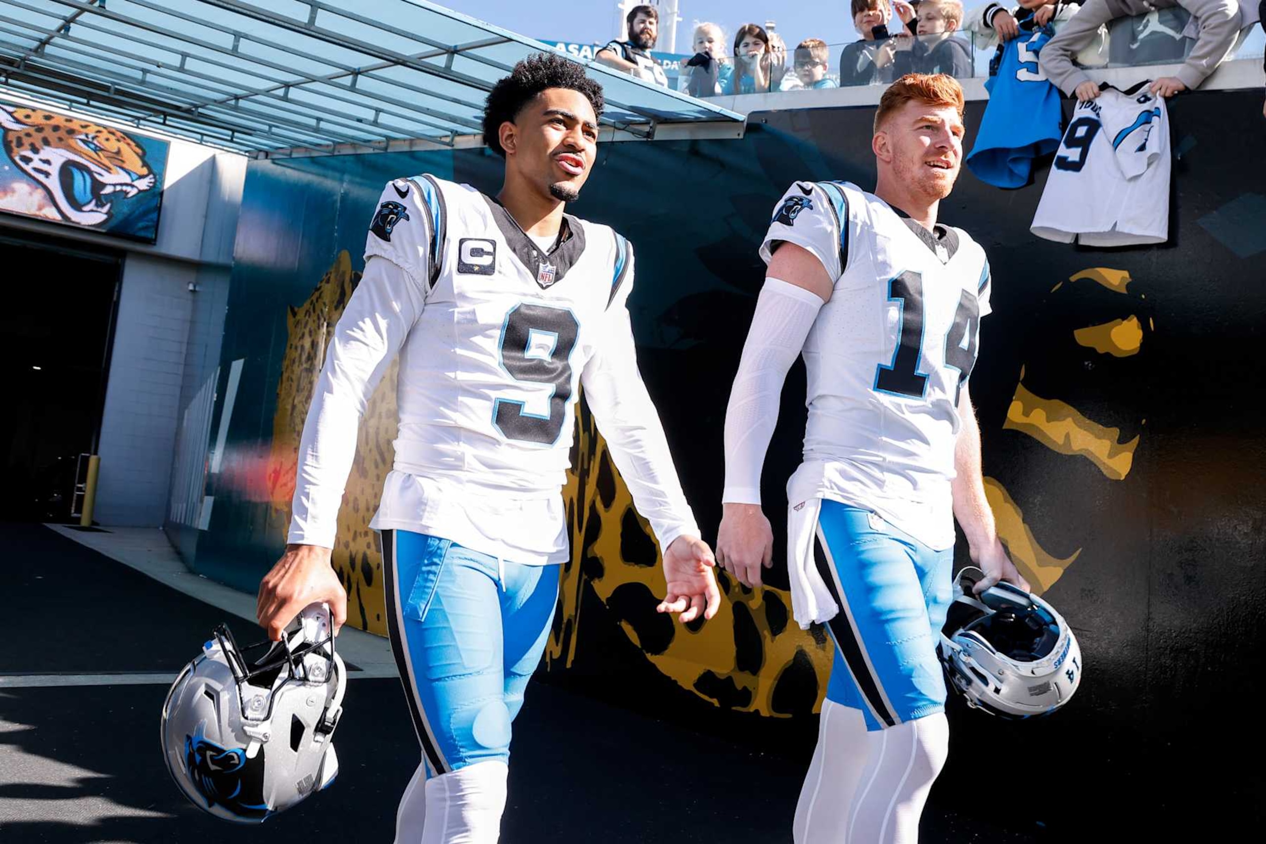 JACKSONVILLE, FL - DECEMBER 31: Quarterbacks Bryce Young #9 and Andy Dalton #14 of the Carolina Panthers take to the field before the start of the game against the Jacksonville Jaguars at EverBank Stadium on December 31, 2023 in Jacksonville, Florida. The Jaguars defeated the Panthers 26 to 0. (Photo by Don Juan Moore/Getty Images)