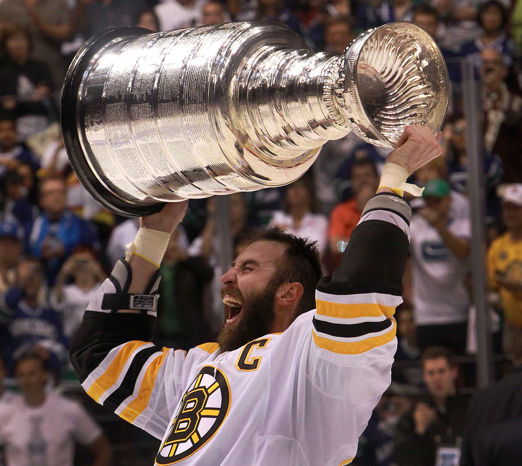 VANCOUVER - JUNE 15: Boston Bruins defenseman Zdeno Chara (#33) hoists the Stanley Cup Trophy. The Boston Bruins took on the Vancouver Canucks in Game 7 of the NHL Stanley Cup Finals at Rogers Arena in Vancouver. (Photo by Barry Chin/The Boston Globe via Getty Images)