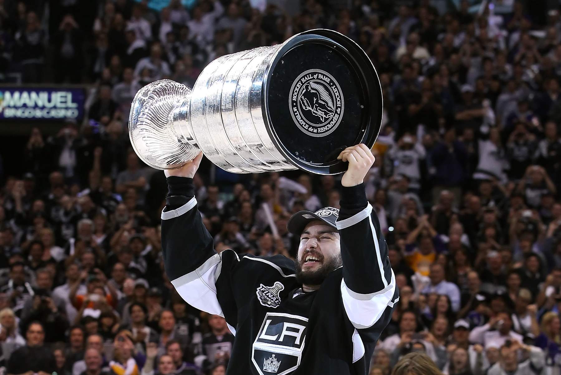 LOS ANGELES, CA - JUNE 11: Drew Doughty #8 of the Los Angeles Kings hoists the Stanley Cup in celebration after defeating the New Jersey Devils in Game Six of the 2012 Stanley Cup Finals at Staples Center on June 11, 2012 in Los Angeles, California. The Kings defeated the Devils 6-1 to win the series 4 games to 2. (Photo by Christian Petersen/Getty Images)
