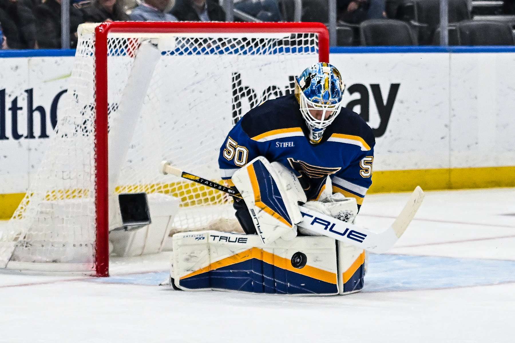 ST. LOUIS, MO - April 12: St. Louis Blues goaltender Jordan Binnington (50) makes a save during a regular season game between the Carolina Hurricanes and the St. Louis Blues on April 12, 2024, at the Enterprise Center in St. Louis MO (Photo by Rick Ulreich/Icon Sportswire via Getty Images)