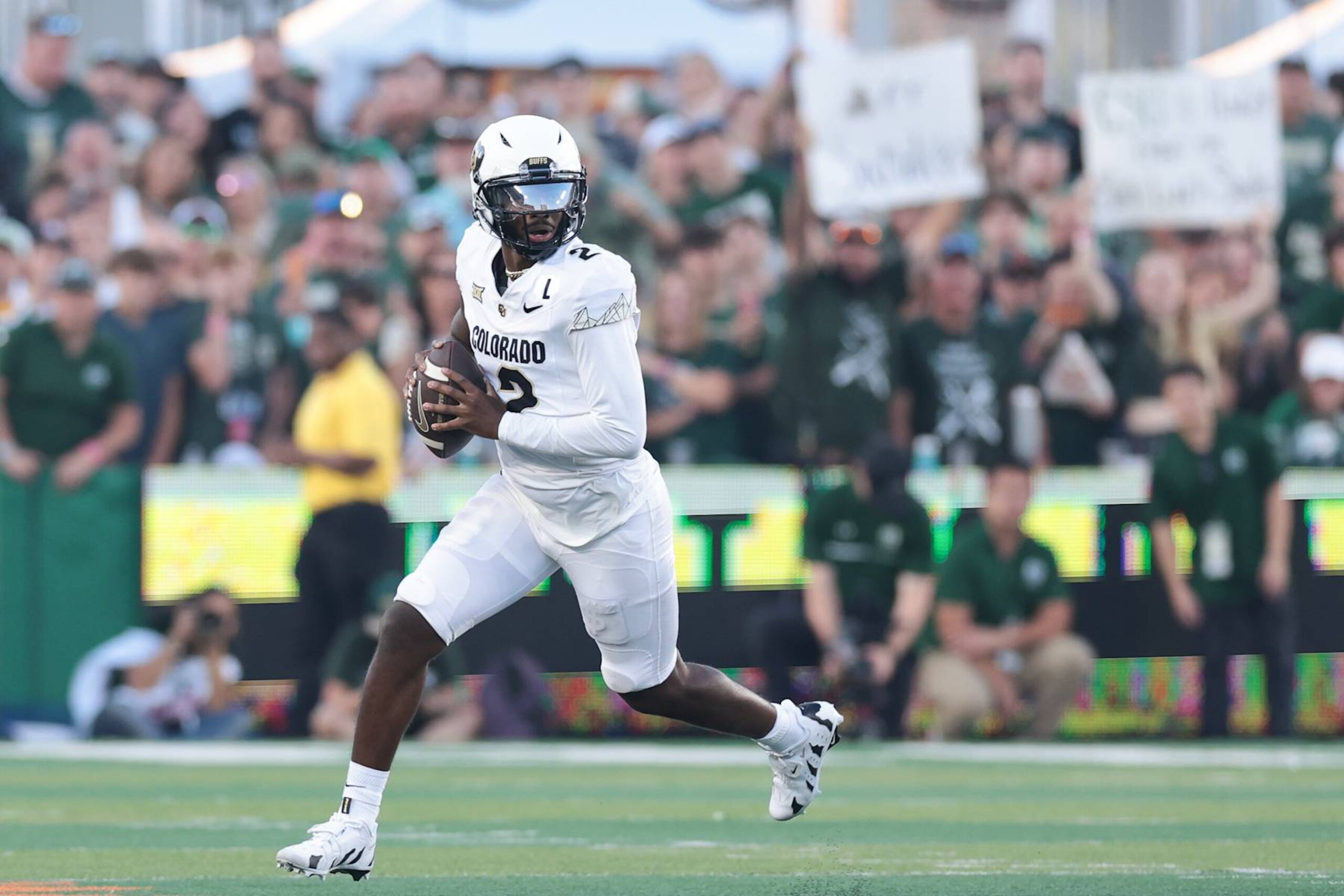 FORT COLLINS, COLORADO - SEPTEMBER 14: Shedeur Sanders #2 of the Colorado Buffaloes runs with the ball during the second quarter against the Colorado State Rams at Canvas Stadium on September 14, 2024 in Fort Collins, Colorado. (Photo by Andrew Wevers/Getty Images)
